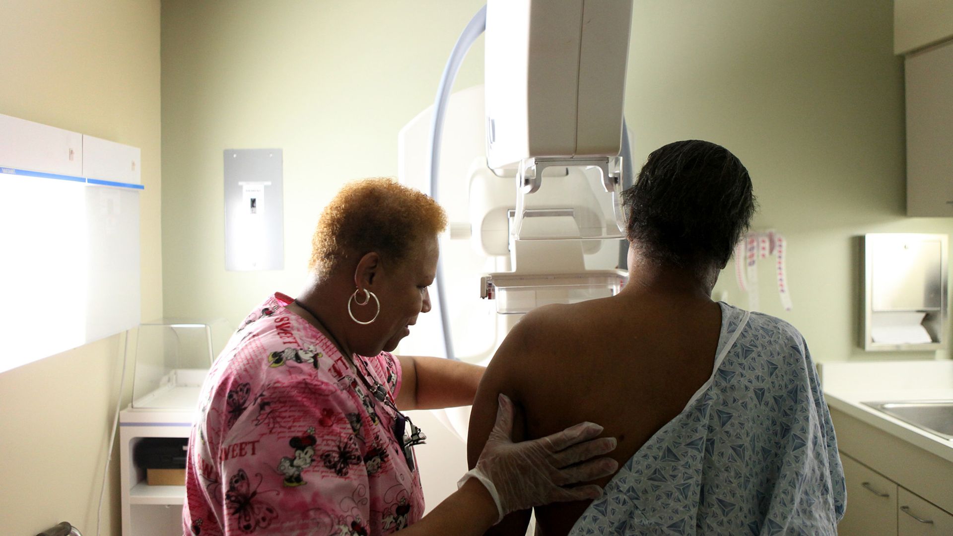 Picture of a doctor and patient during a cancer screening