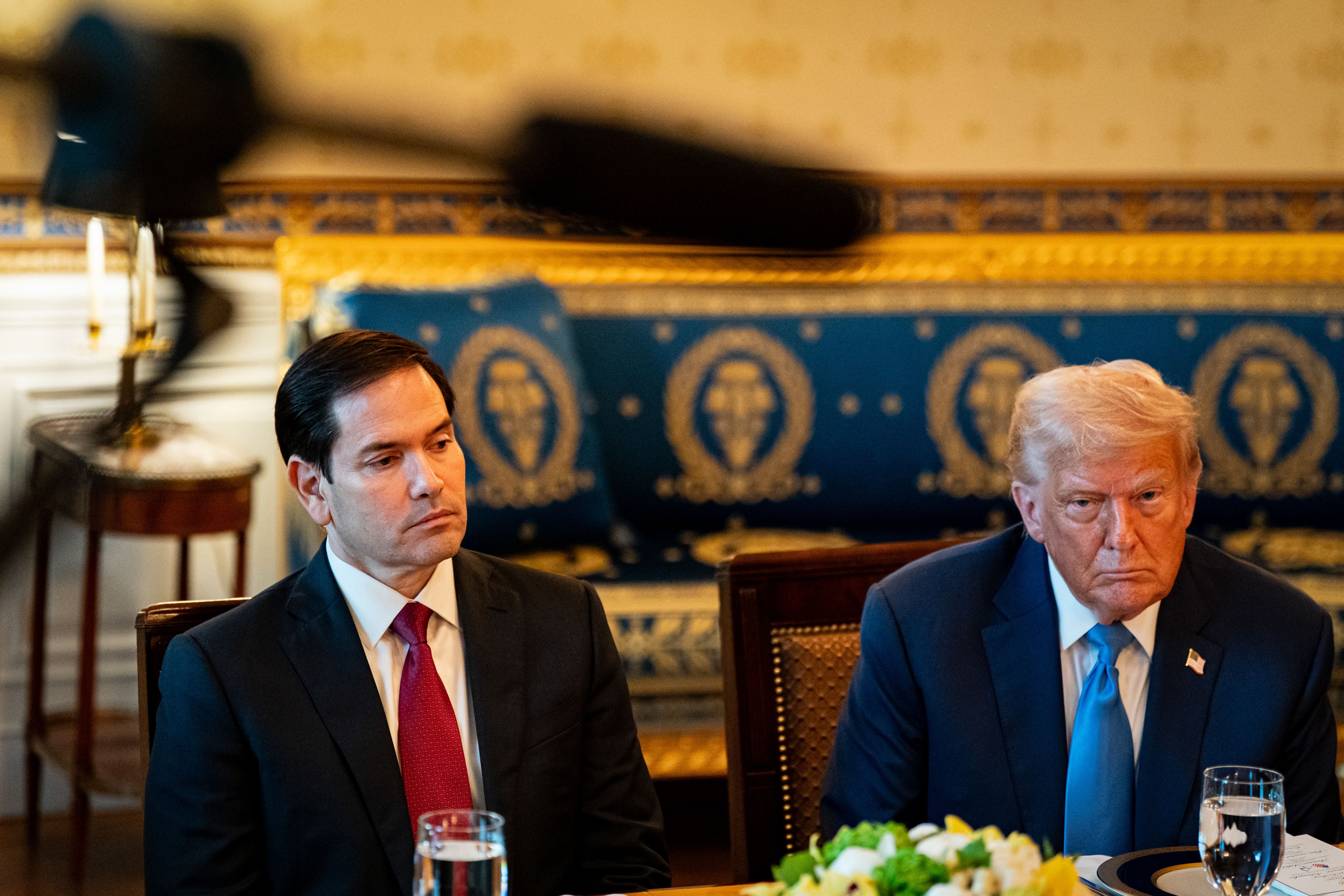 Secretary of State Marco Rubio sits next to President Trump during a dinner with Israeli Prime Minister Benjamin Netanyahu on Monday.