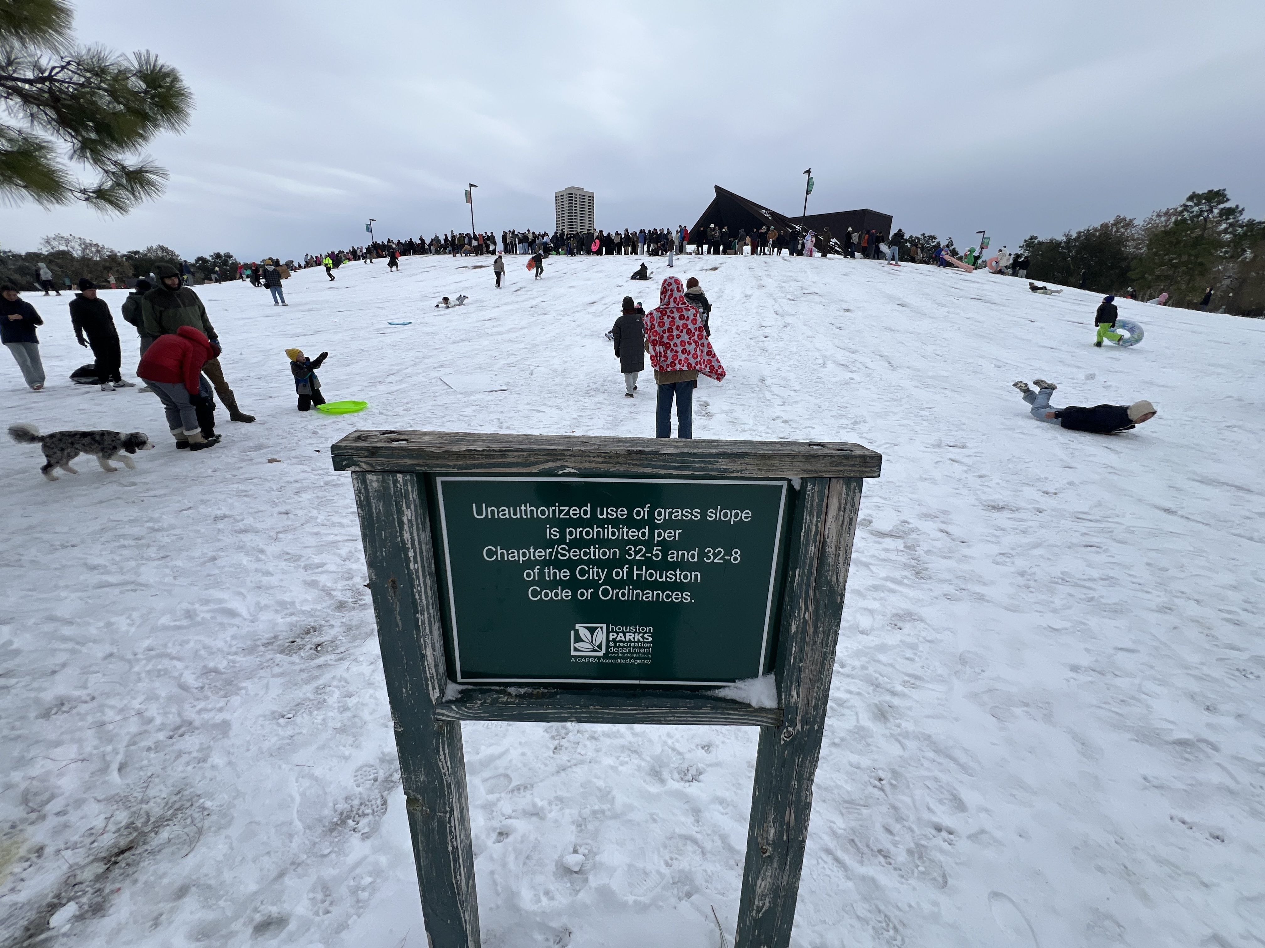 A sign that describes local rules against unauthorized use of the hill