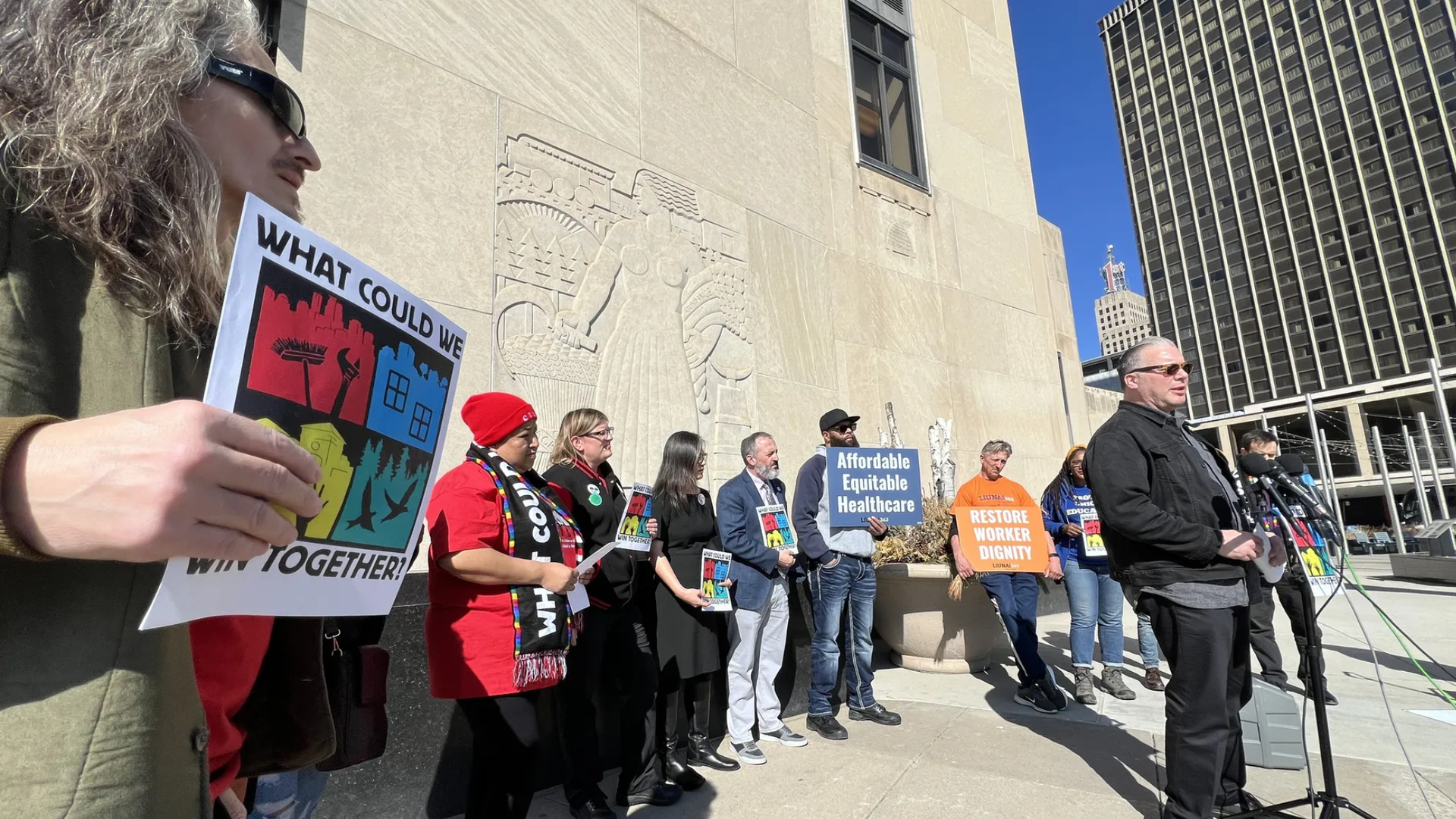 Leaders of multiple labor unions and allied organizations hold a press conference at St. Paul City Hall to announce  plans to simultaneously strike during the first week of March. Photo: Kyle Stokes/Axios