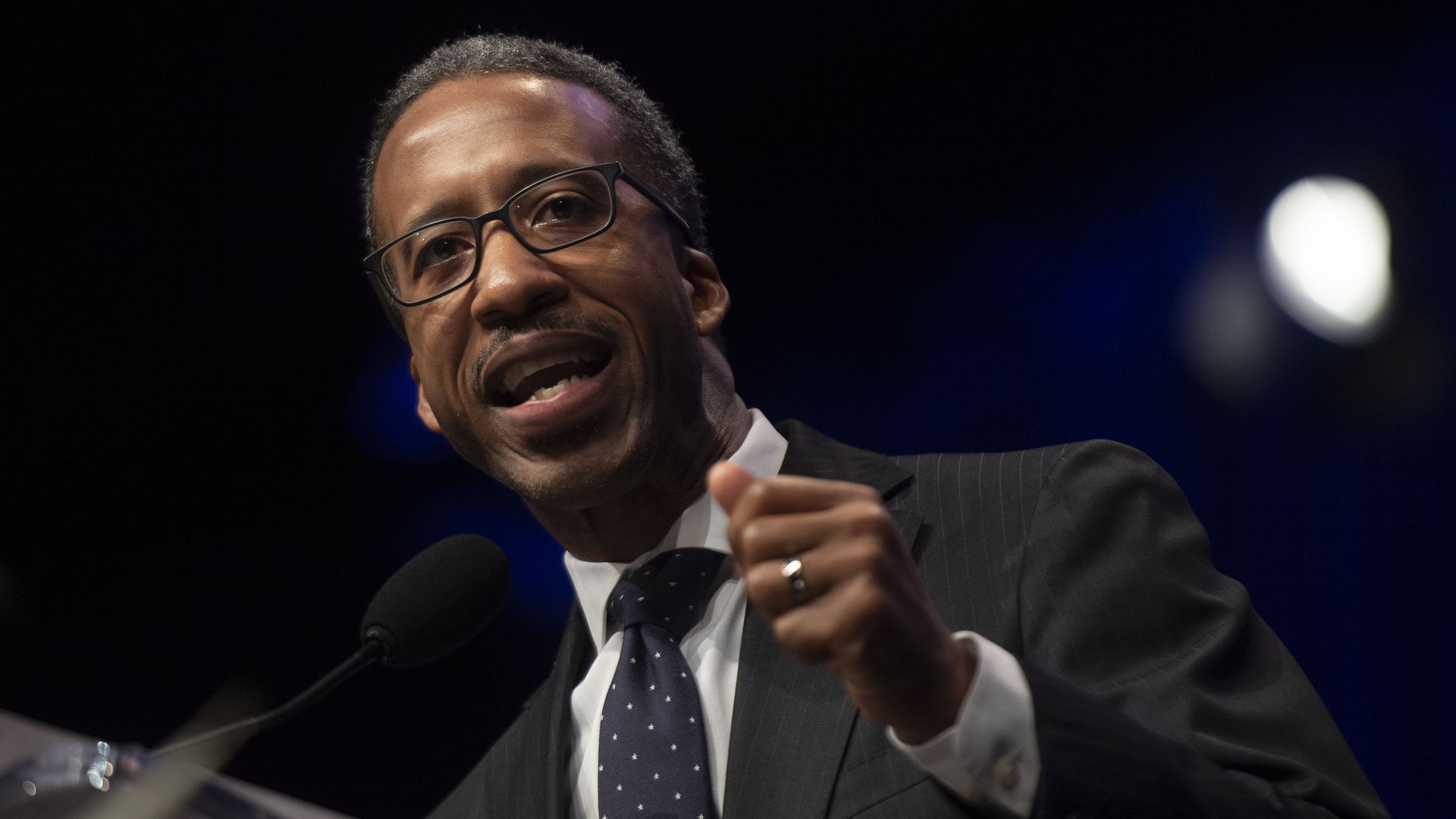 Kenyan McDuffie speaks at a podium