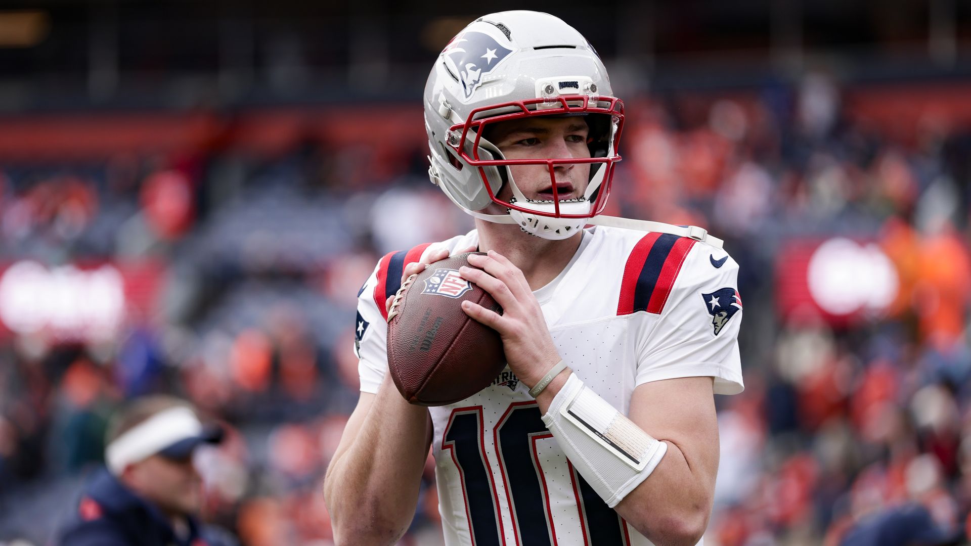 Drake Maye #10 of the New England Patriots warms up prior to the AFC Championship NFL football game against the Denver Broncos at Empower Field At Mile High on January 25, 2026 in Denver, Colorado. (Photo by Kara Durrette/Getty Images)