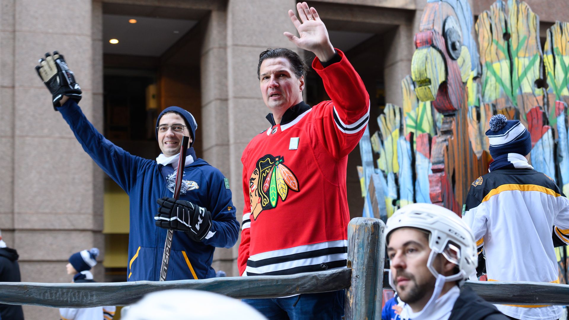 Two guys in a Blackhawks parade 