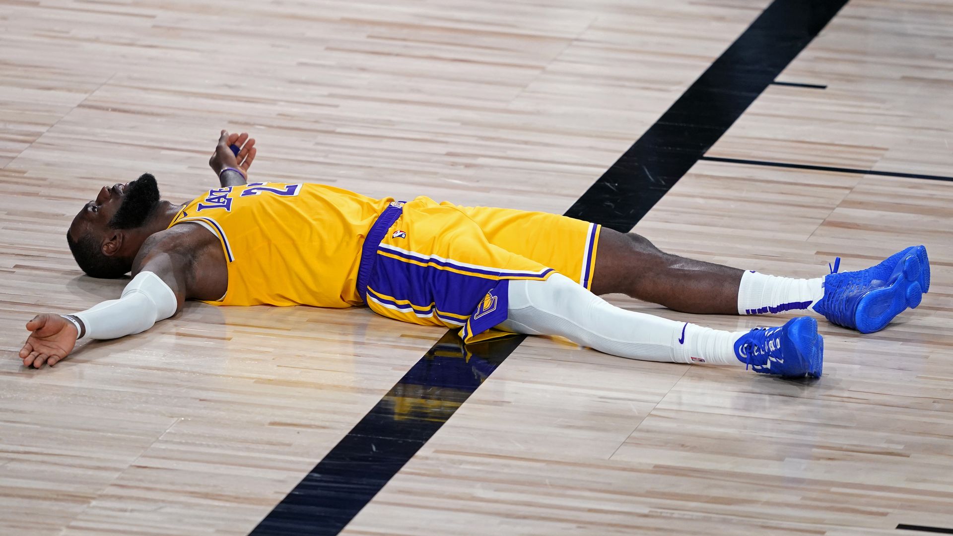 LeBron James lays on the ground