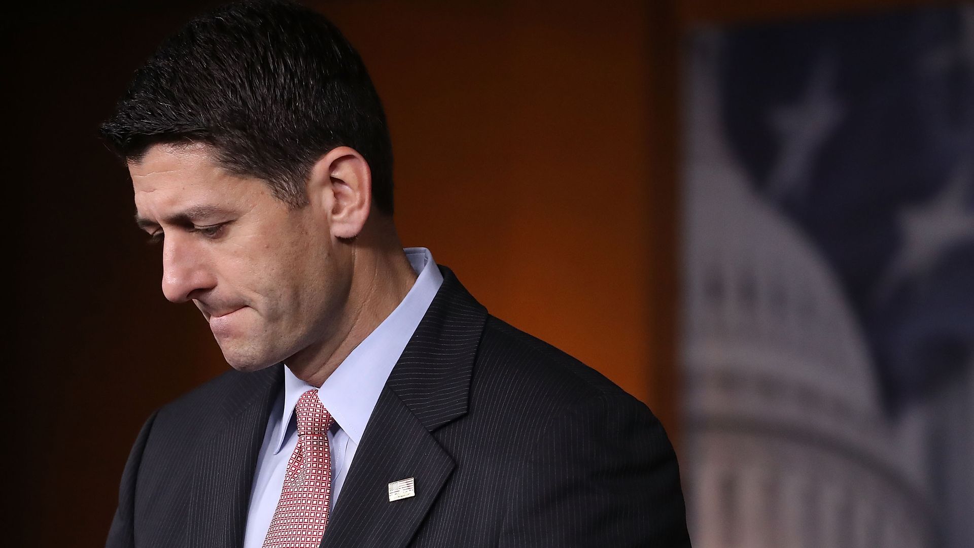 Paul Ryan looks down