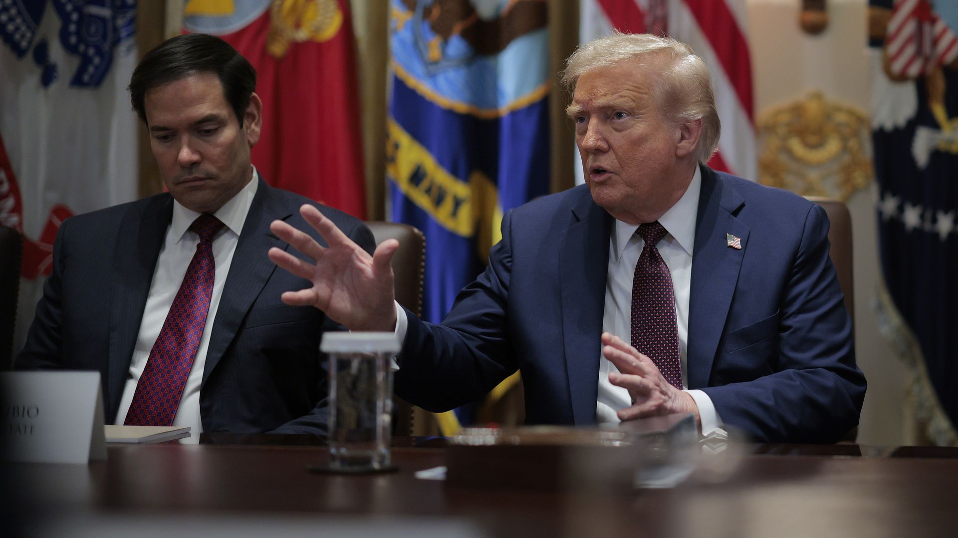  Secretary of State Marco Rubio (L) listens to U.S. President Donald Trump speak a cabinet meeting with members of his administration in the Cabinet Room of the White House on August 26, 2025 in Washington, DC.  Photo: Chip Somodevilla/Getty Images.