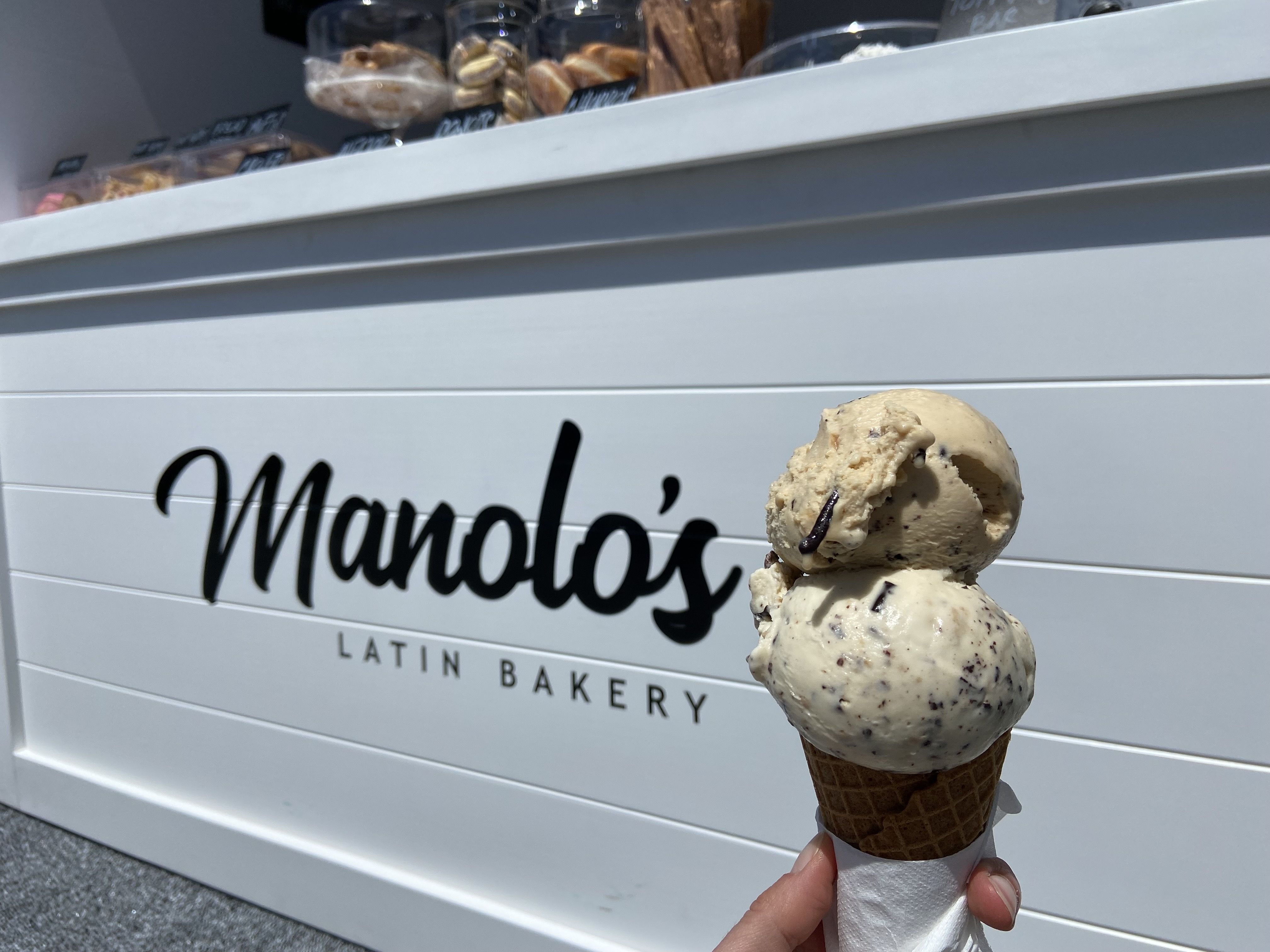 The gelato is made with coconut milk. Pictured here is a scoop of cookie dough and a scoop of salted caramel. Photo: Ashley Mahoney/Axios