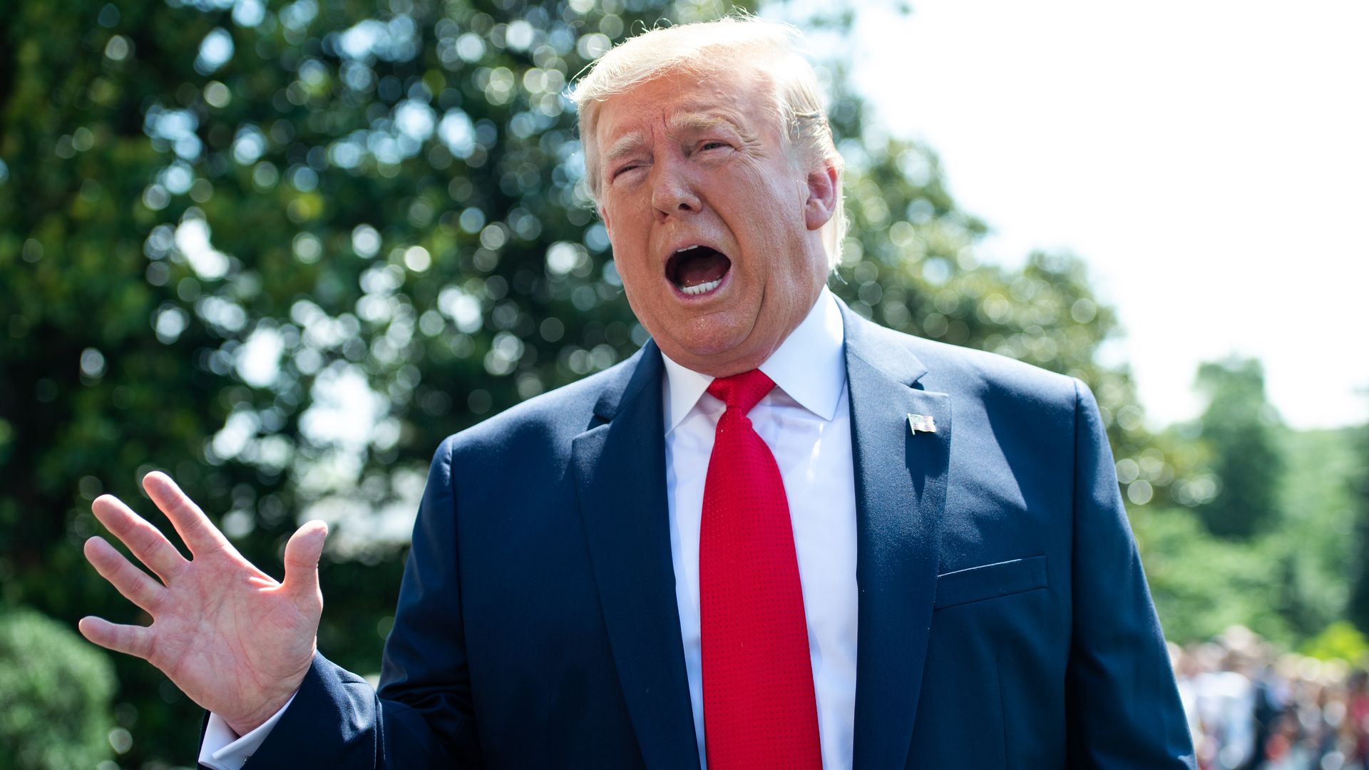 President Donald Trump speaks to the media as he walks to Marine One prior to departing from the South Lawn of the White House in Washington, DC, July 5.