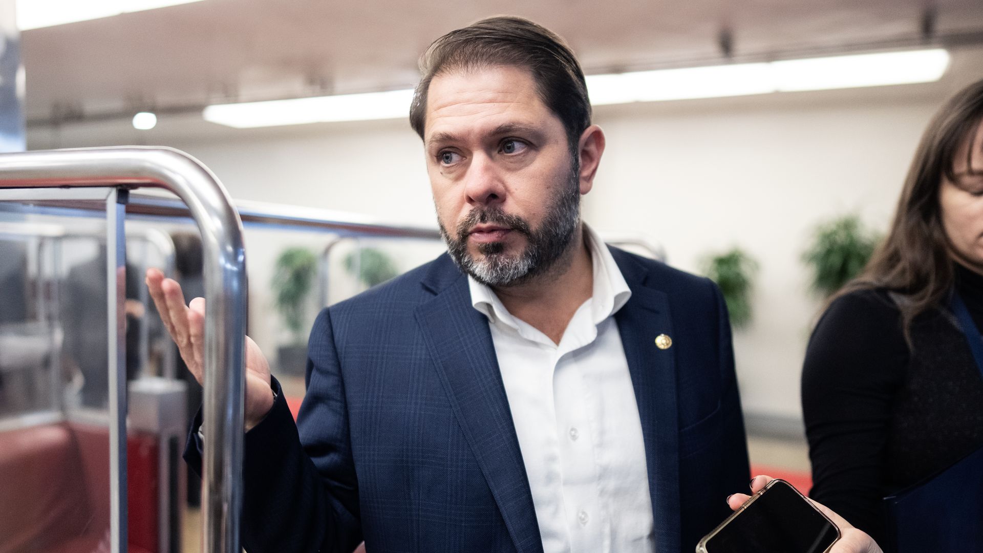 Sen. Ruben Gallego exits the underground tram on Capitol Hill.