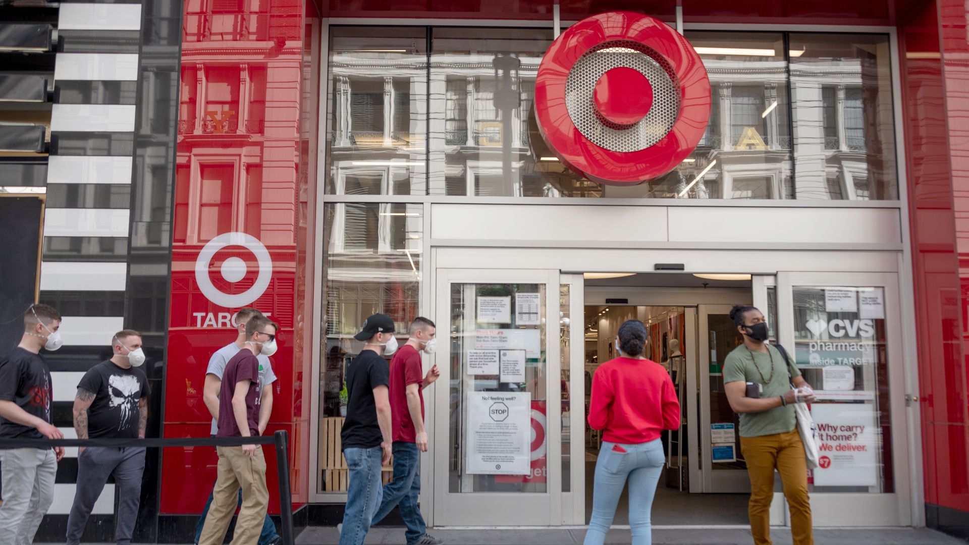 People waiting in line outside of Target