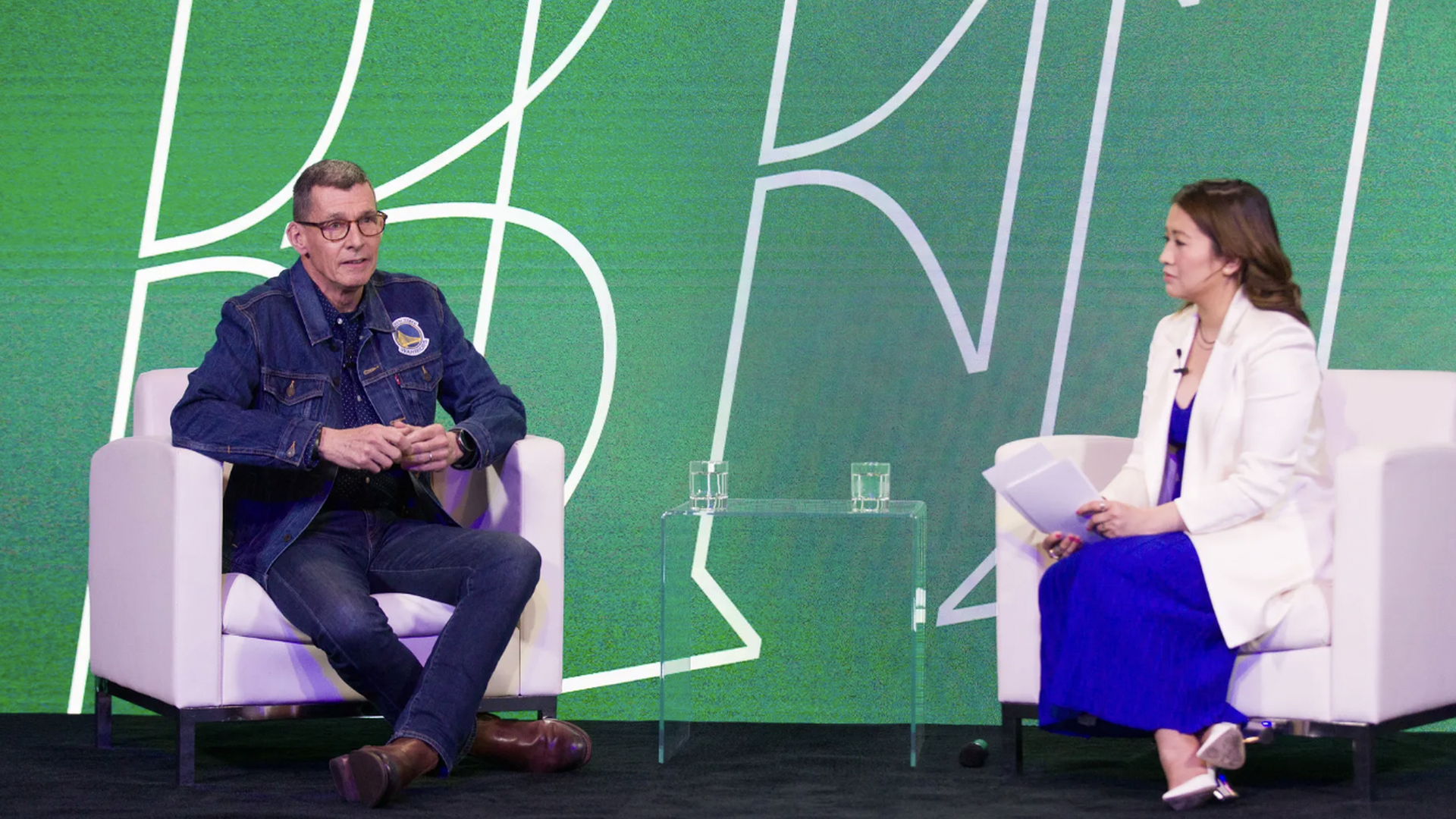 Photo of Levi Strauss CEO Chip Bergh with Axios' Hope King on stage at Axios' BFD event in San Francisco.