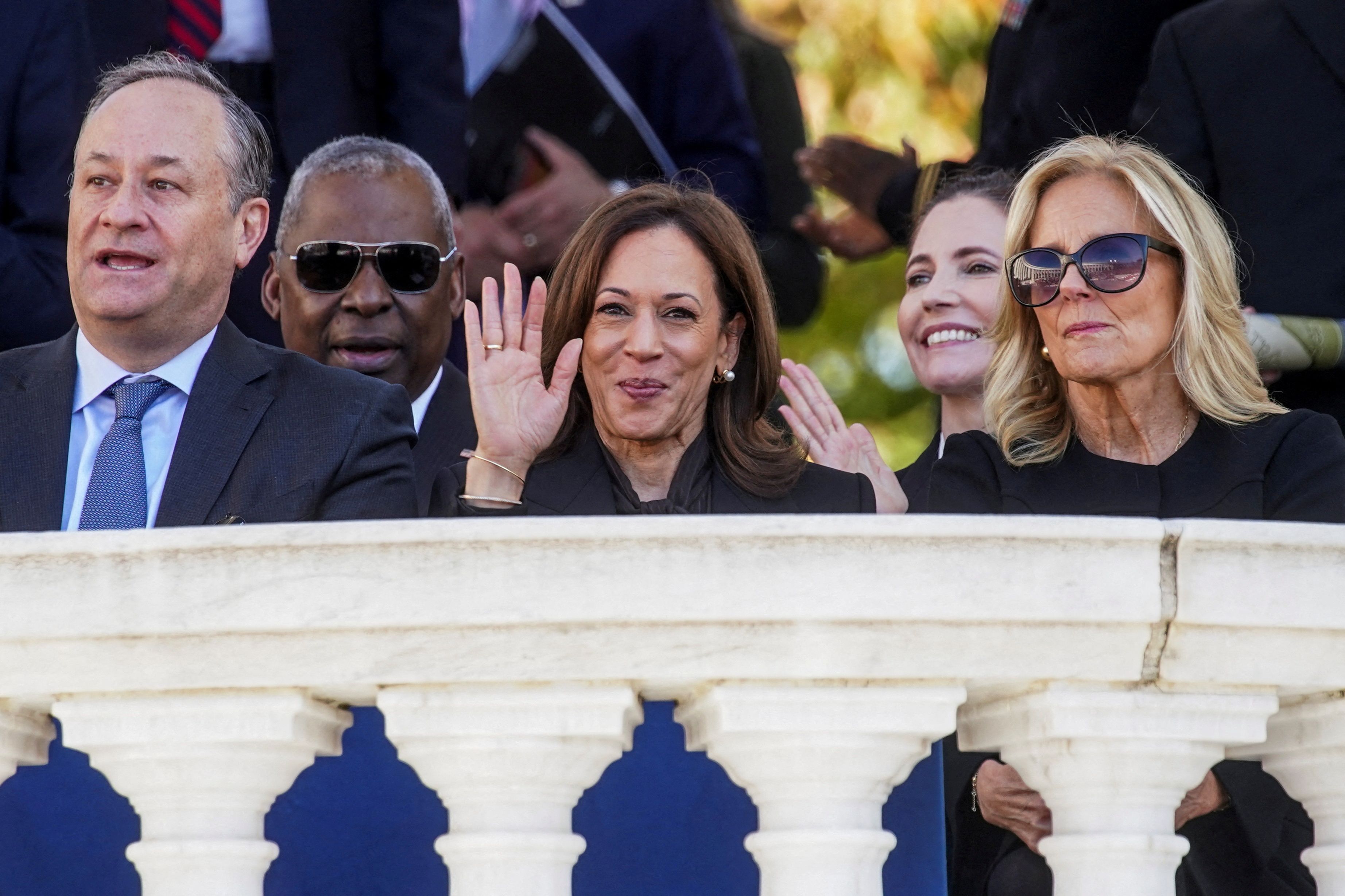 U.S. Vice President Kamala Harris, second gentleman Doug Emhoff, Defense Secretary Lloyd Austin and first lady Jill Biden attend a ceremony during the National Veterans Day Observance in Arlington National Cemetery in Arlington, Virginia, U.S., November 11, 2024. REUTERS/Kevin Lamarque