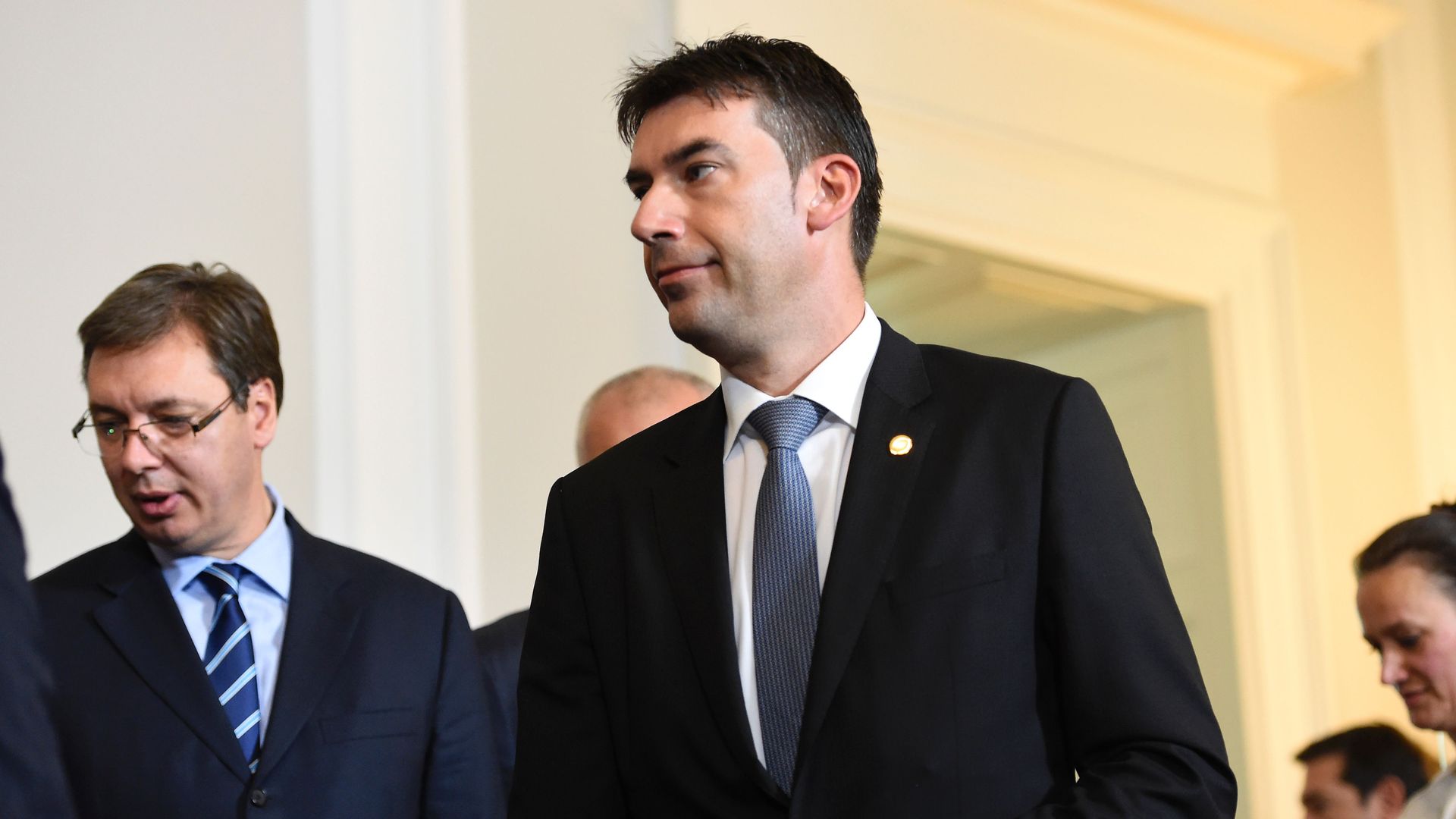 Romania's Foreign Minister Dragos Tudorache walks after a meeting on the Balkan migrant route into the EU in Vienna on September 24, 2016
