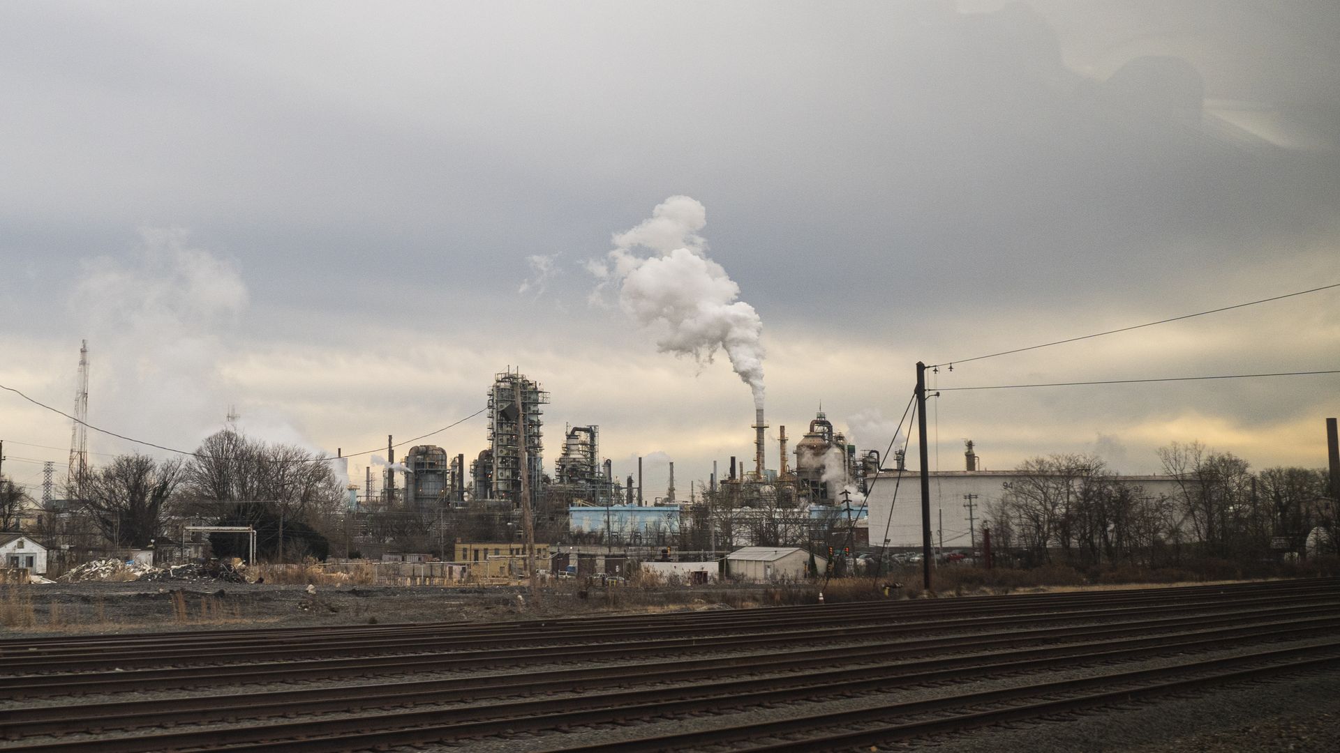 Industrial pollution pours from an oil refinery January 8, 2021 near New Castle, Delaware. 