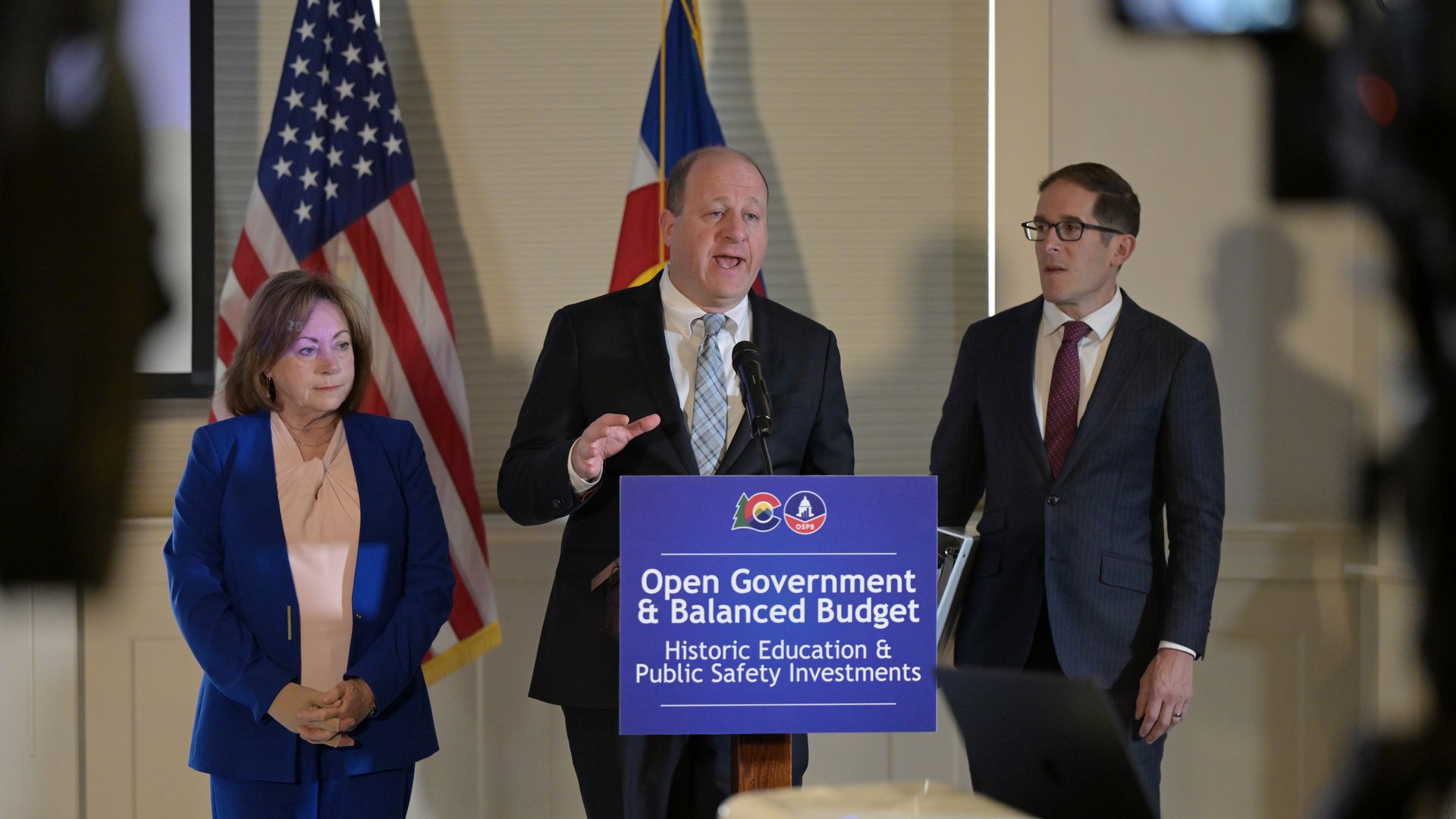 From left, Lt. Gov. Diane Primavera, Gov. Jared Polis and Mark Ferrandino, Director of the Office of State Planning and Budget, discuss the administration's budget plan Friday. Photo: Hyoung Chang/The Denver Post via Getty Images