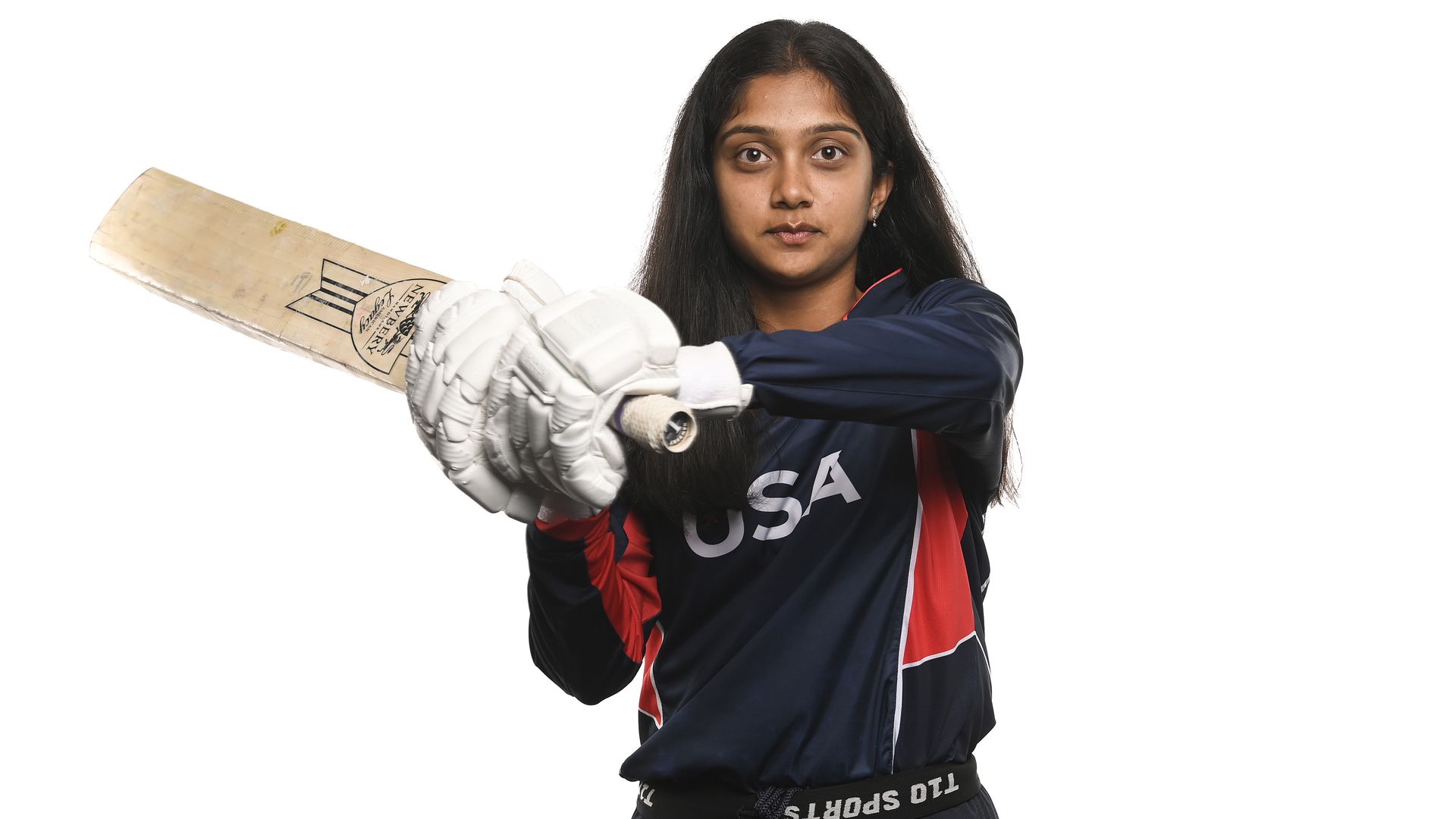 Fort Bend ISD high schooler Pooja Shah poses with a cricket bat 