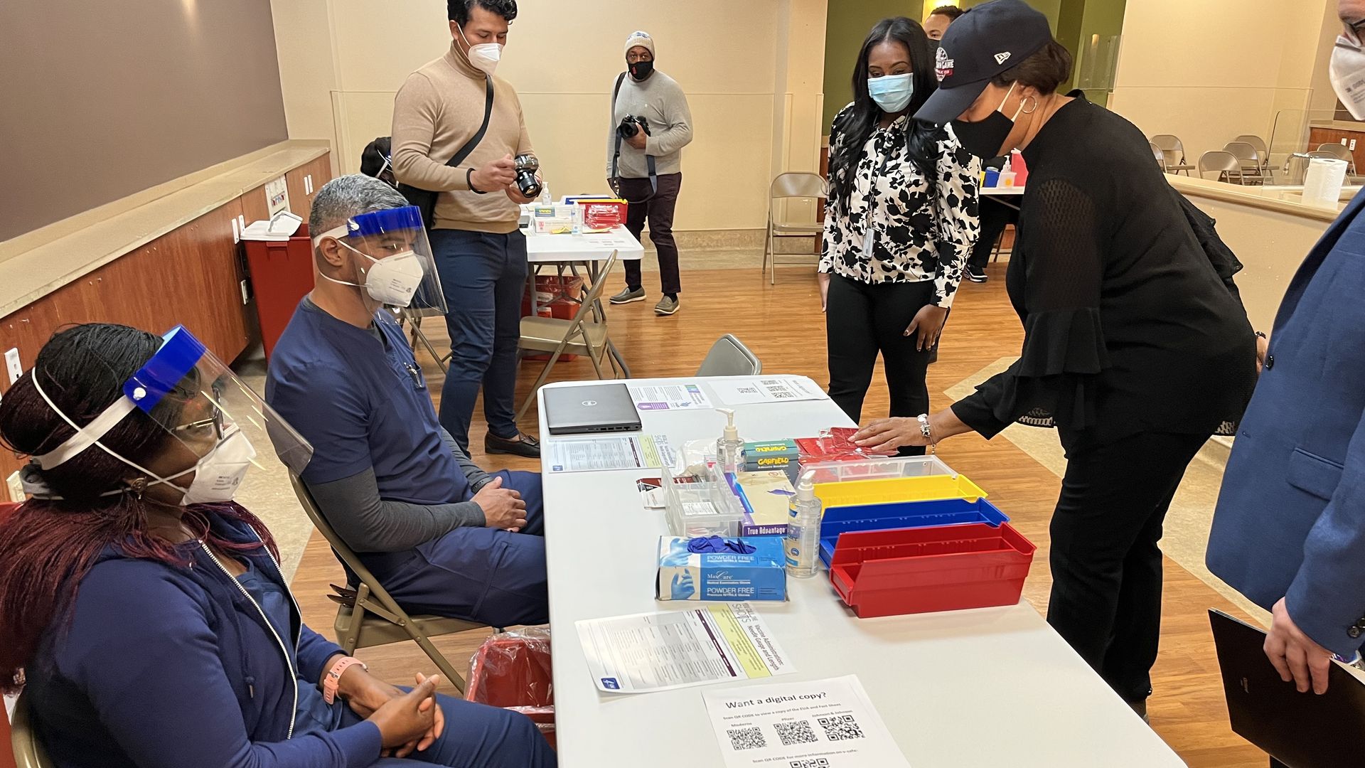 Mayor Muriel Bowser and D.C. Health workers at a COVID testing and vaccination center
