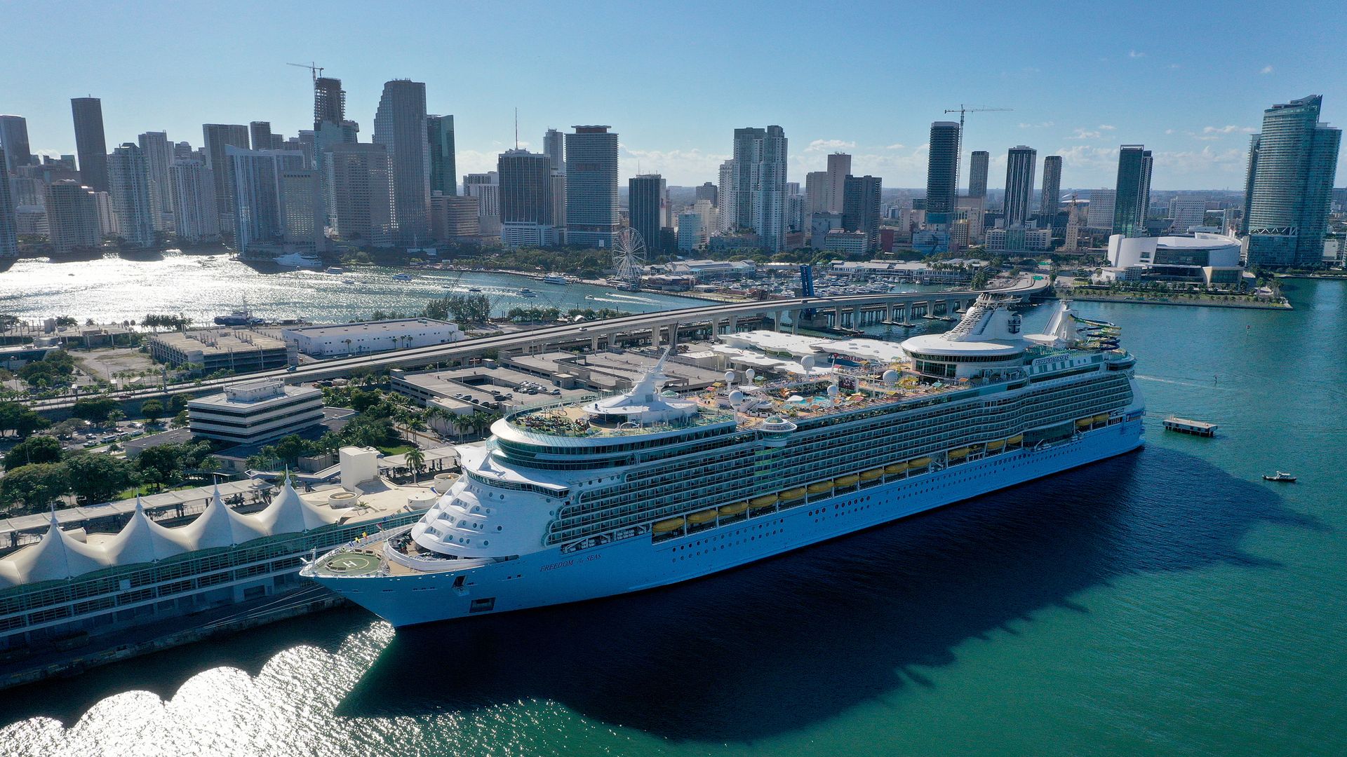 A cruise ship waits for people to embark before leaving PortMiami on December 31, 2021 in Miami, Florida. 