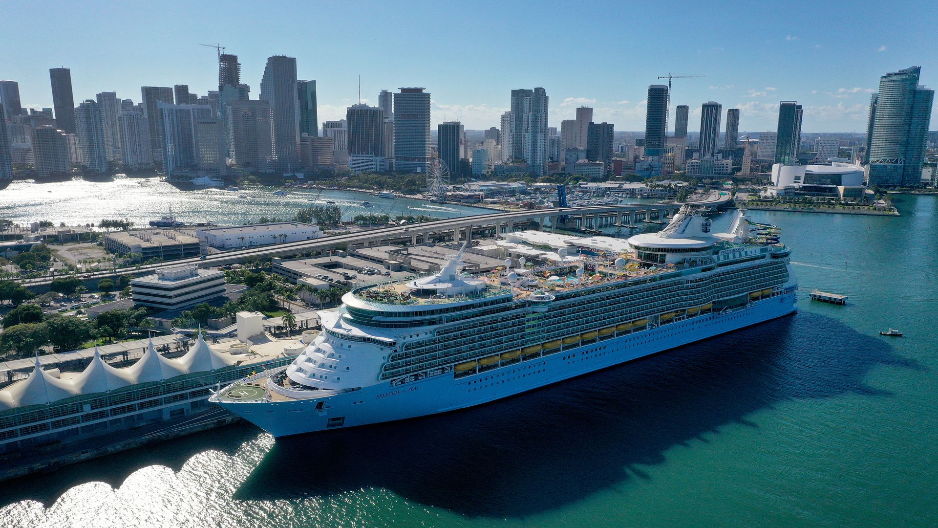 A cruise ship waits for people to embark before leaving PortMiami on December 31, 2021 in Miami, Florida.