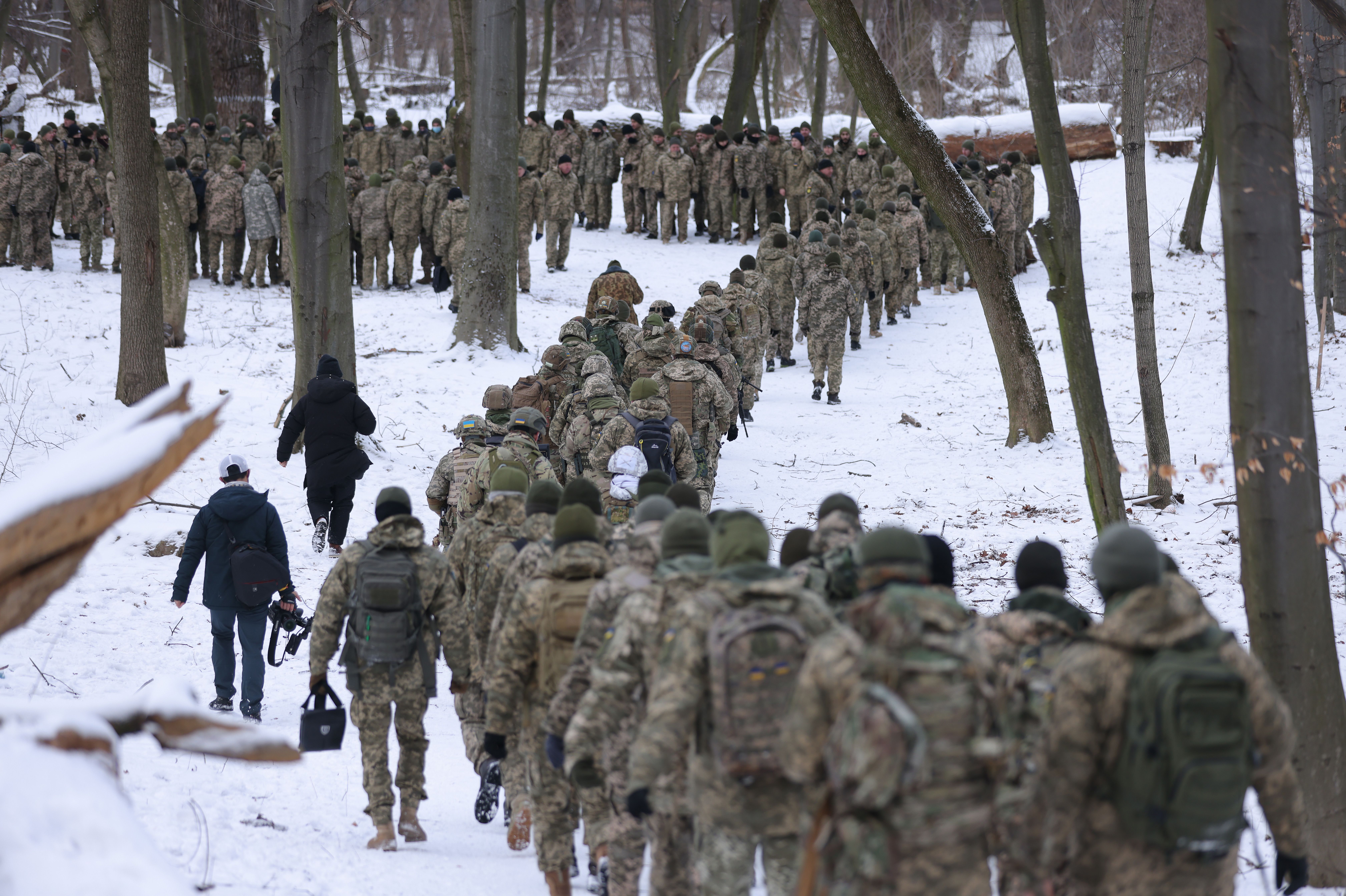 Civilian participants in a Kyiv Territorial Defence unit train on a Saturday in a forest on January 22, 2022 in Kyiv, Ukraine.