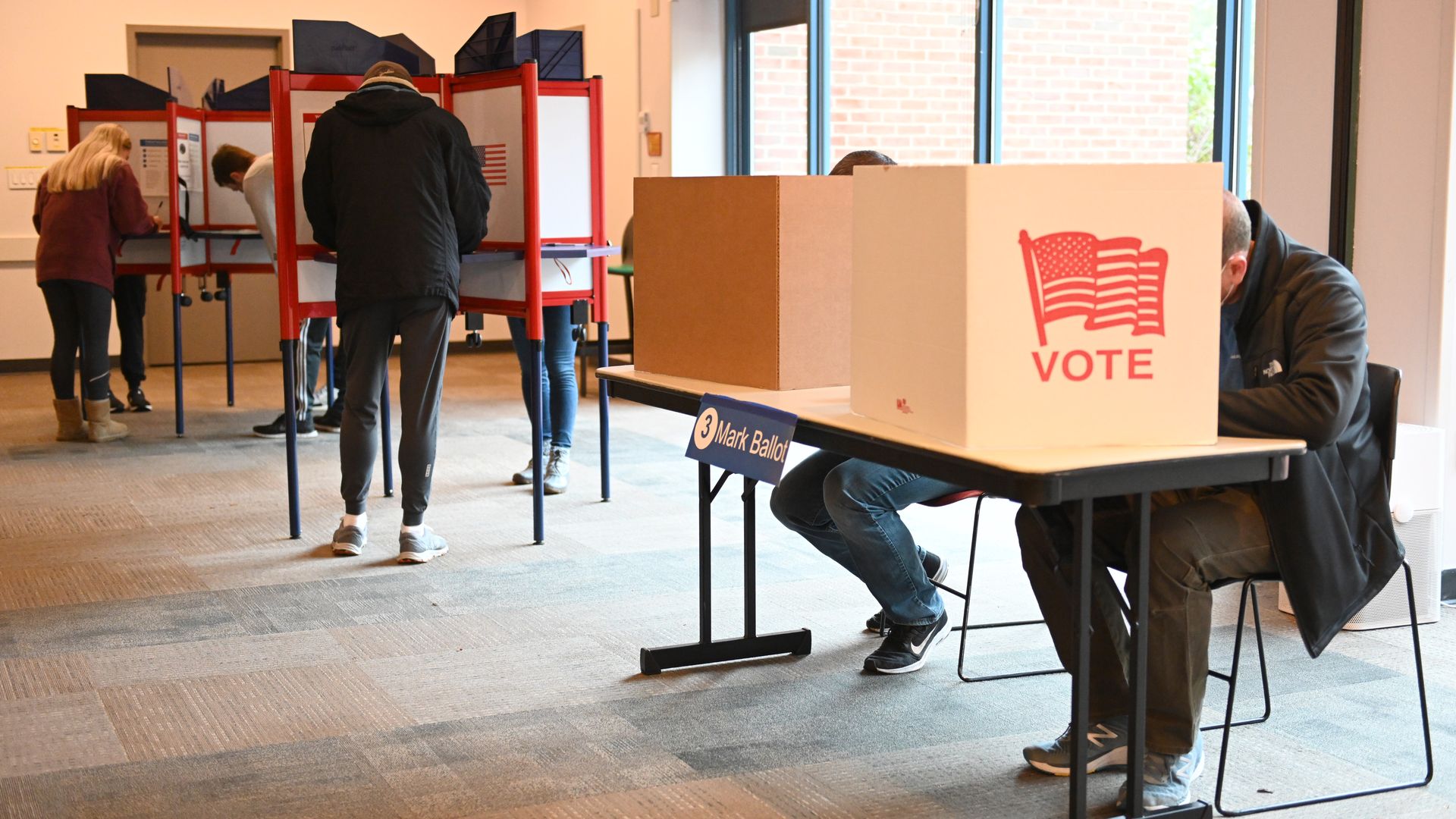 Voters cast ballots at a polling location in Arlington during the Virginia governor election