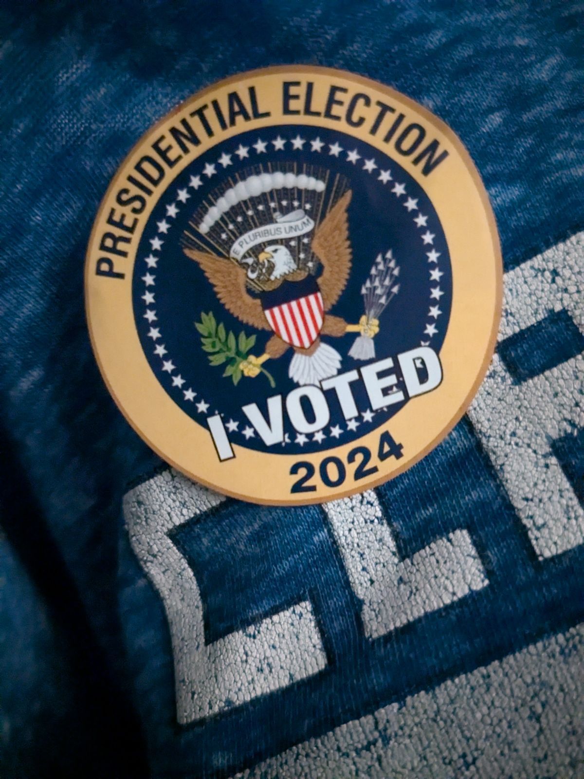 Photo shows an "I voted" sticker