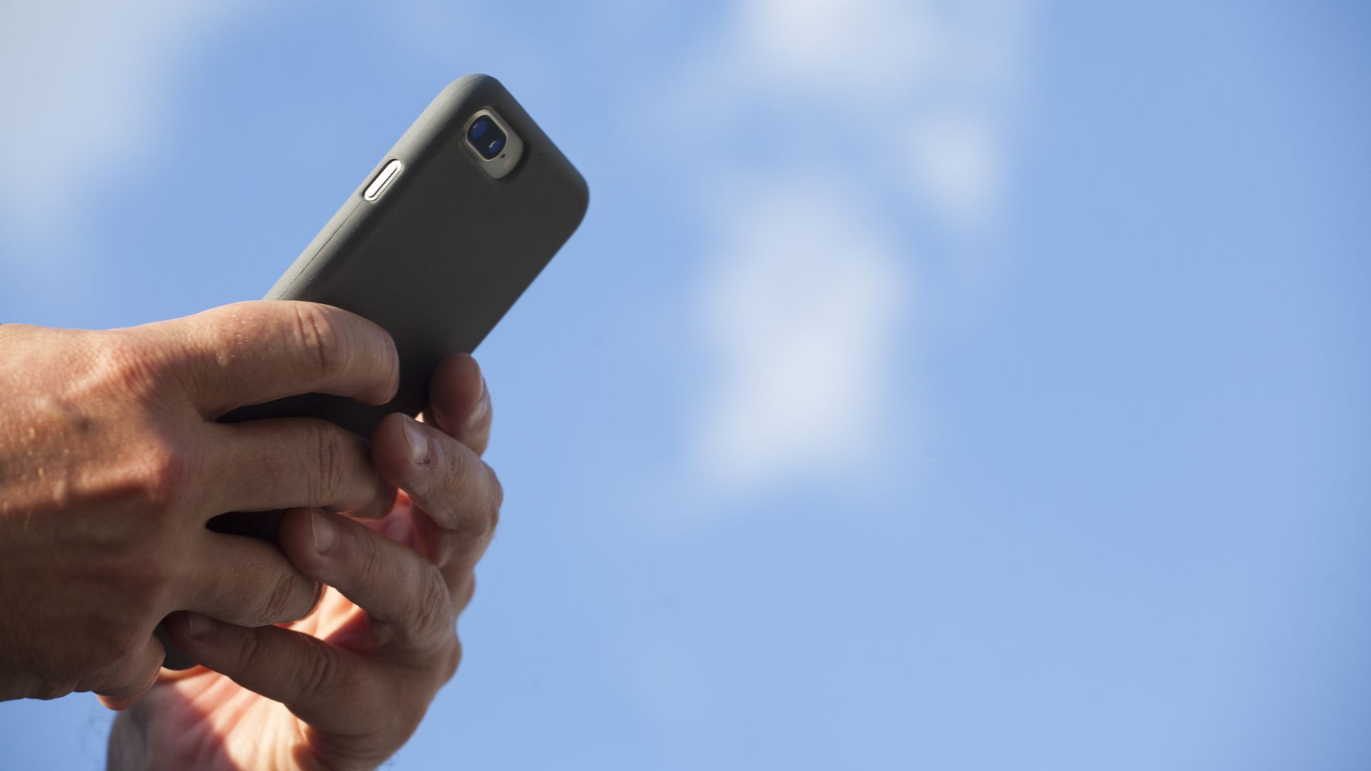 A person uses a smartphone