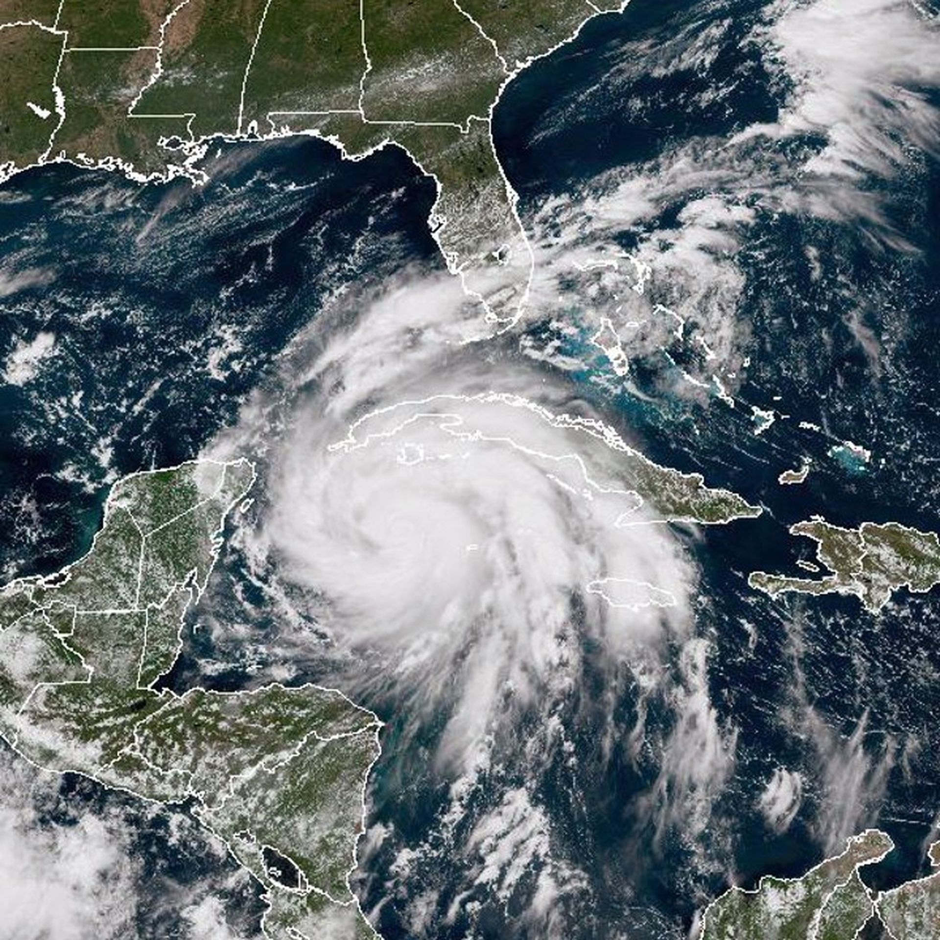 In this NOAA handout image taken by the GOES satellite at 17:30 UTC shows Hurricane Ian as it moves toward western Cuba on September 26, 2022 in the Caribbean Sea. 