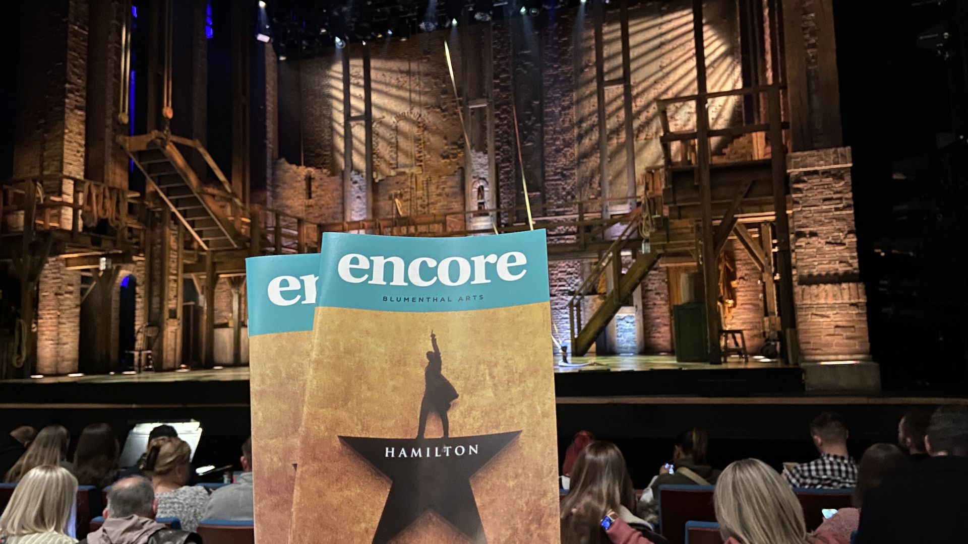 "Hamilton" playbills in front of the show's set at Belk Theater in Uptown Charlotte.