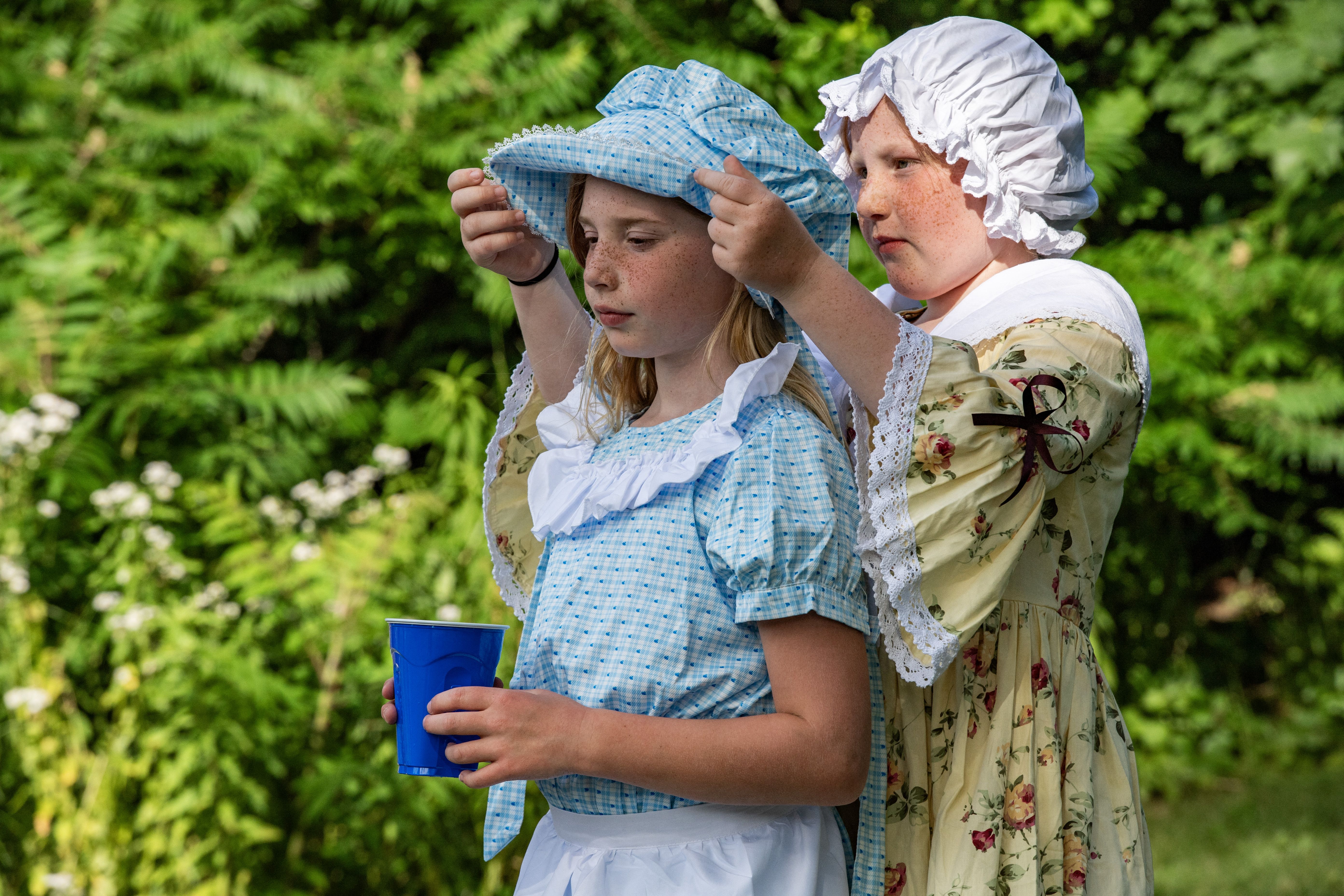 Children dressed in colonial outfits wait for the festivities to begin during the Fishtown Horribles Parade, ahead of Independence Day, in Gloucester, Massachusetts on July 3, 2024. The parade is part of the city's July 4th celebrations. 