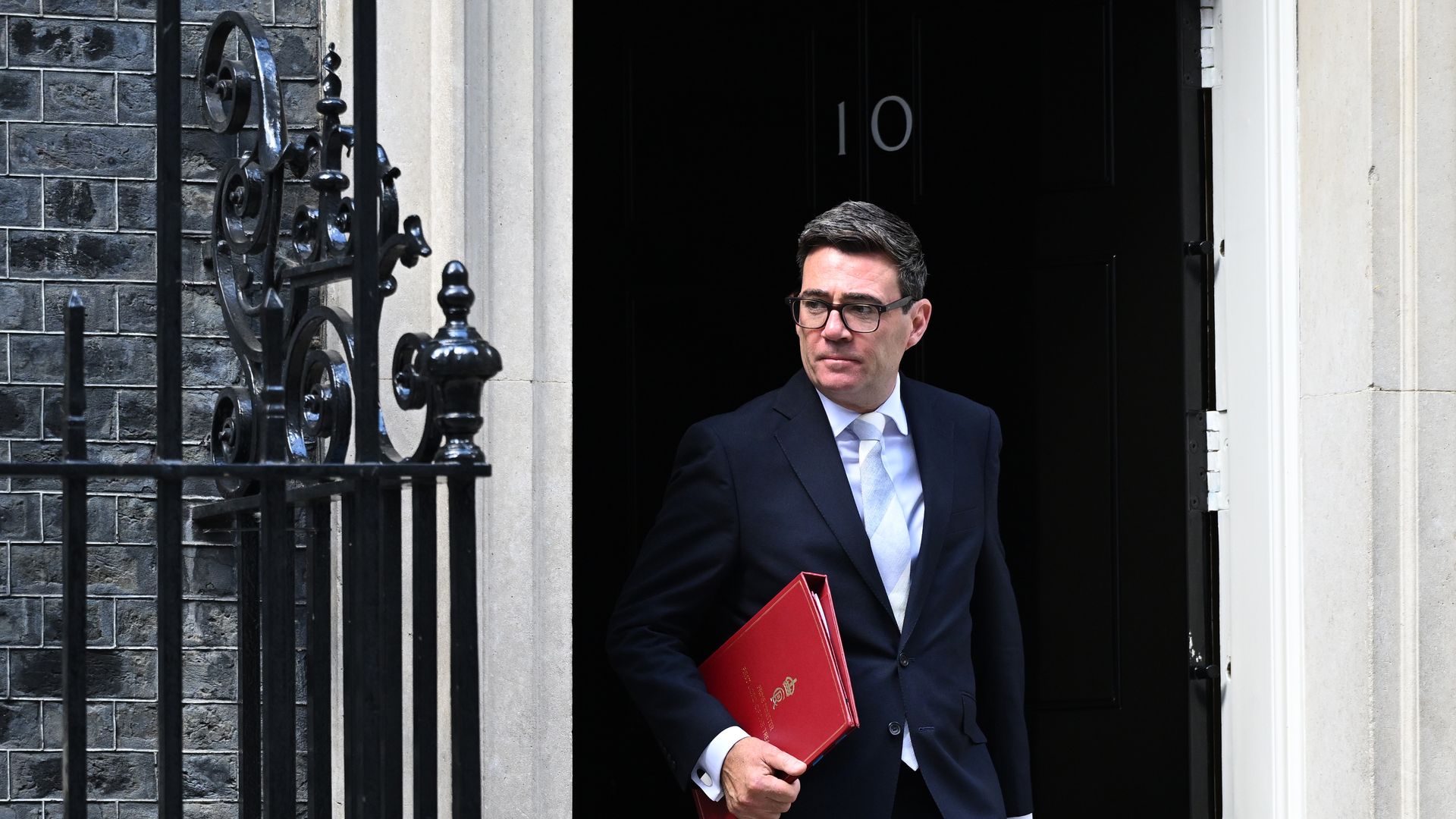 Prime Minister Andy Burnham departs 10 Downing Street to address the House of Commons on Sept. 1.