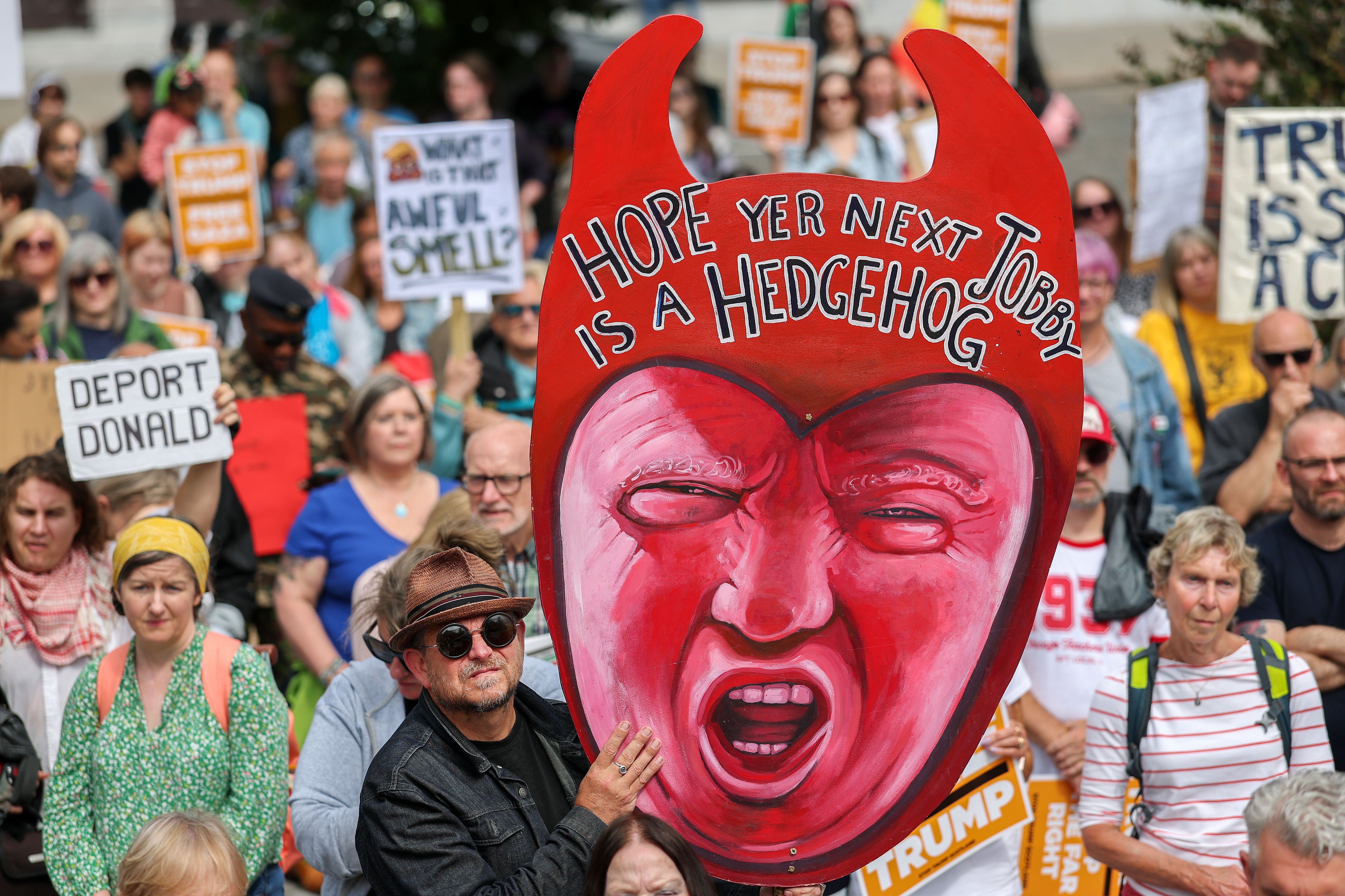 Demonstrators gather at Union Terrace protesting against the visit of President Trump to Scotland on July 26, 2025 in Aberdeen, Scotland.