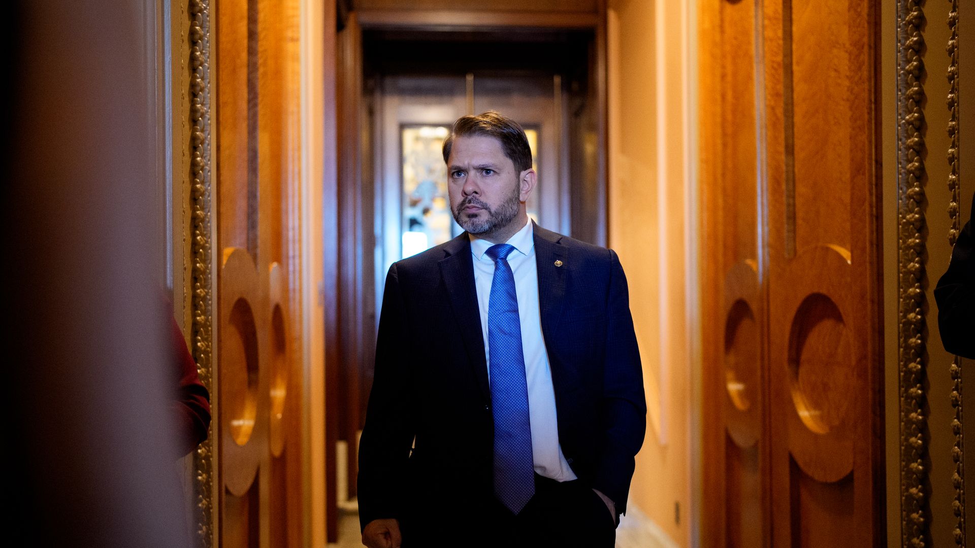 Sen. Ruben Gallego (D-AZ) walks out of the Senate Chamber of the U.S. Capitol Building on October 1, 2025