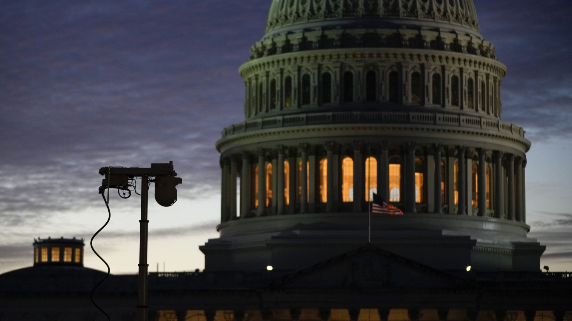 A security camera is seen overlooking the Capitol the night before the first anniversary of the Jan. 6 attack.