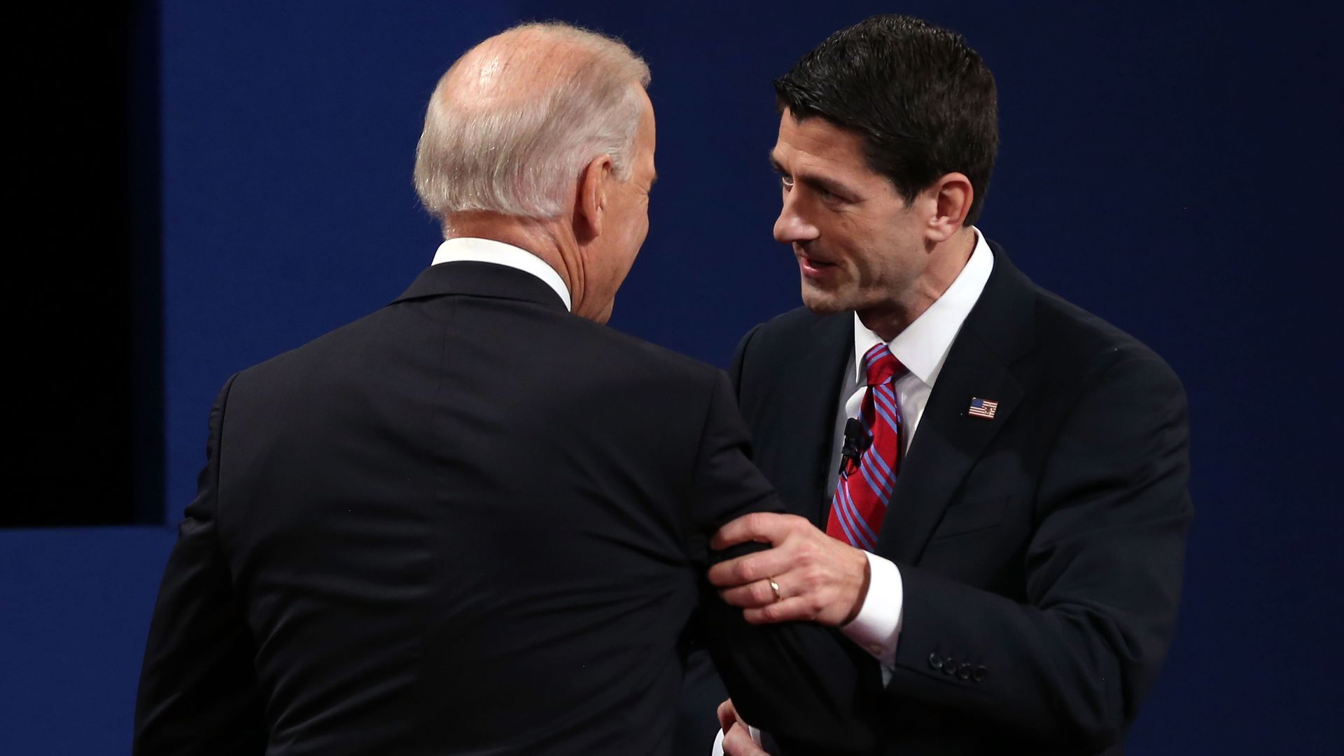 Paul Ryan shakes hands with Joe Biden.