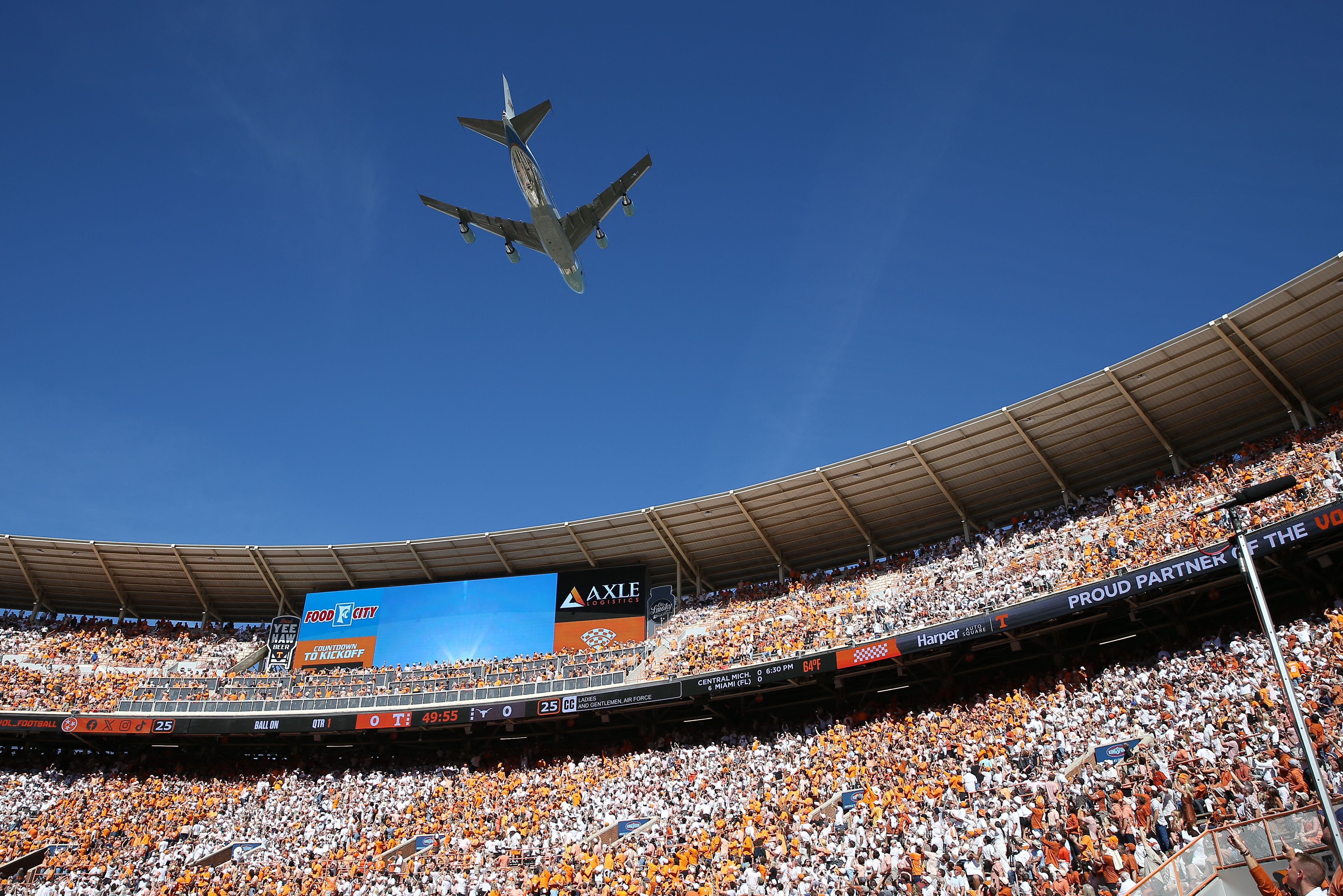 Plane flies over stadium