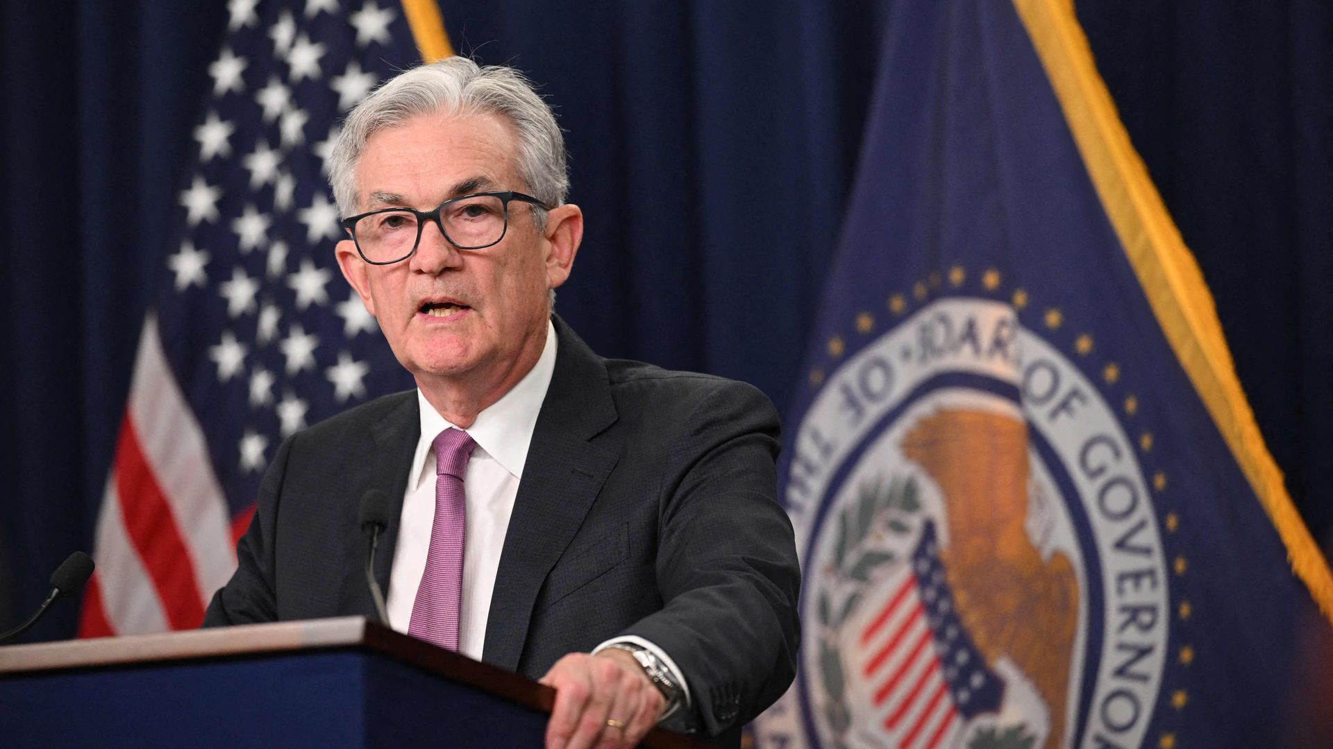 Fed chair Jerome Powell stands at a podium