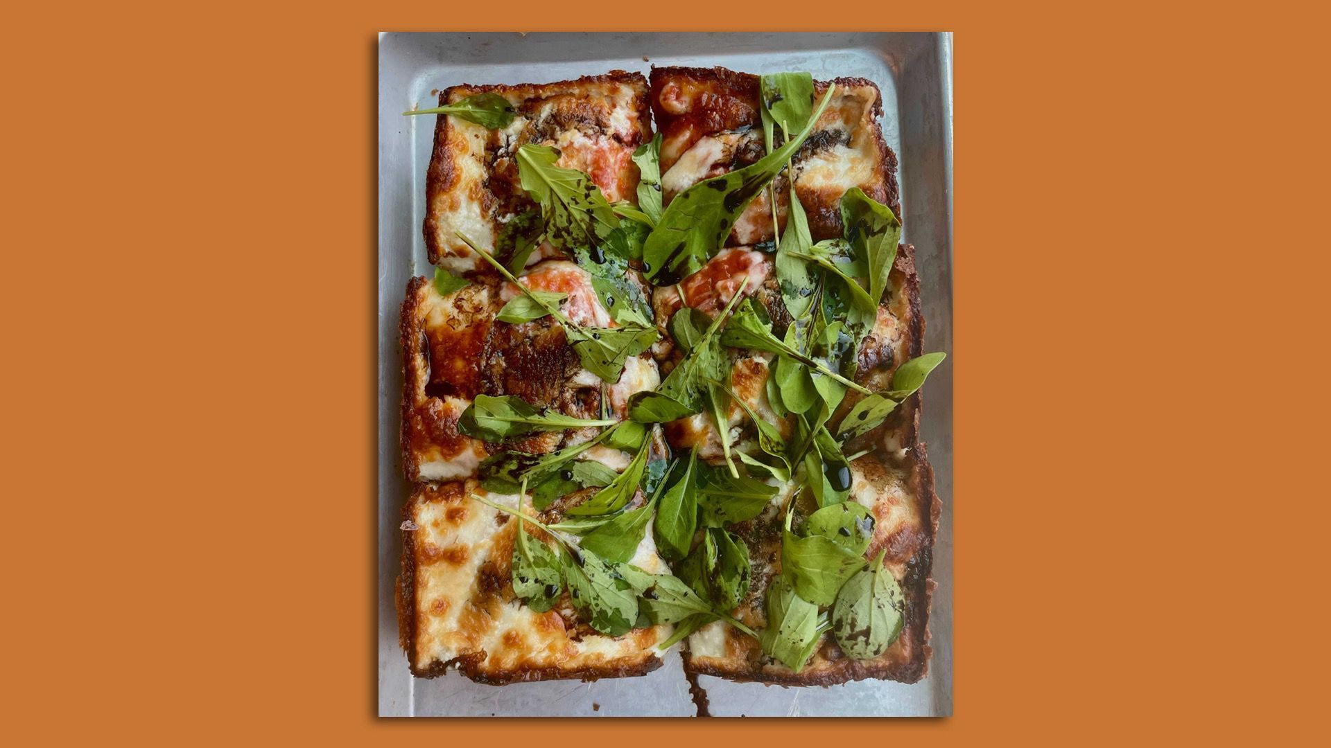 A Detroit-style pizza topped with arugula from Minneapolis' Wrecktangle Pizza.