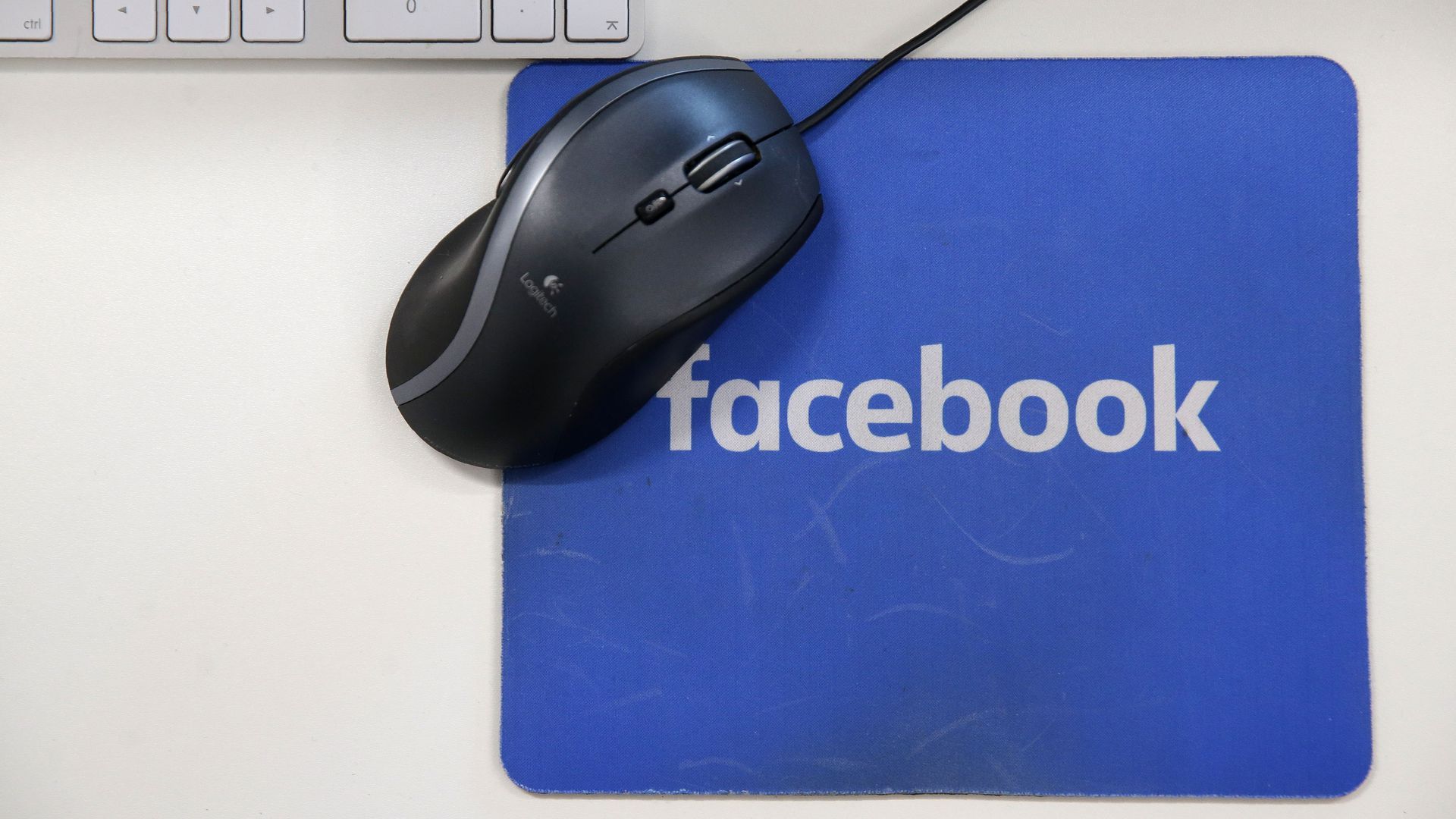 Facebook logo on a mousepad