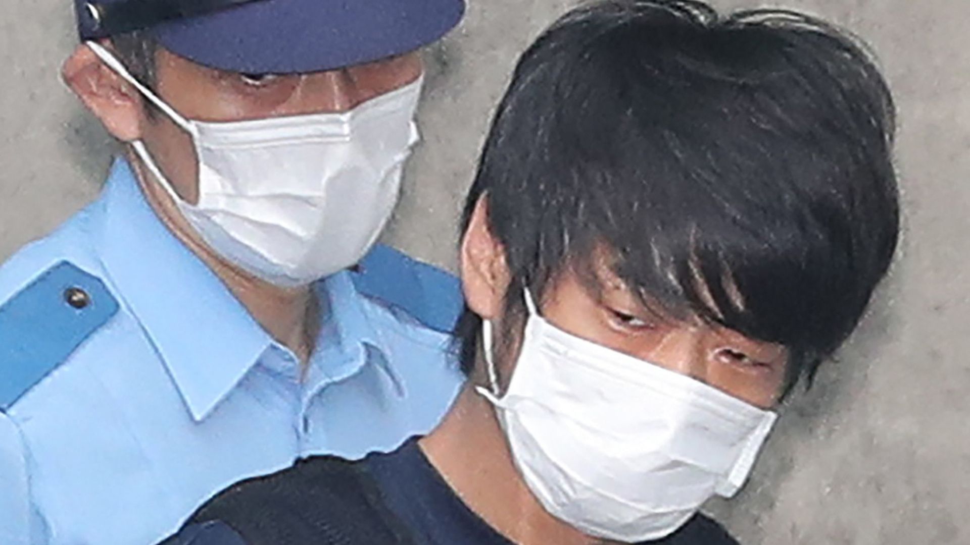 Tetsuya Yamagami, the man accused of murdering former Japanese Prime Minister Shinzo Abe, is transferred from the Nara Nishi police station for psychiatric examination in Nara on July 25, 2022