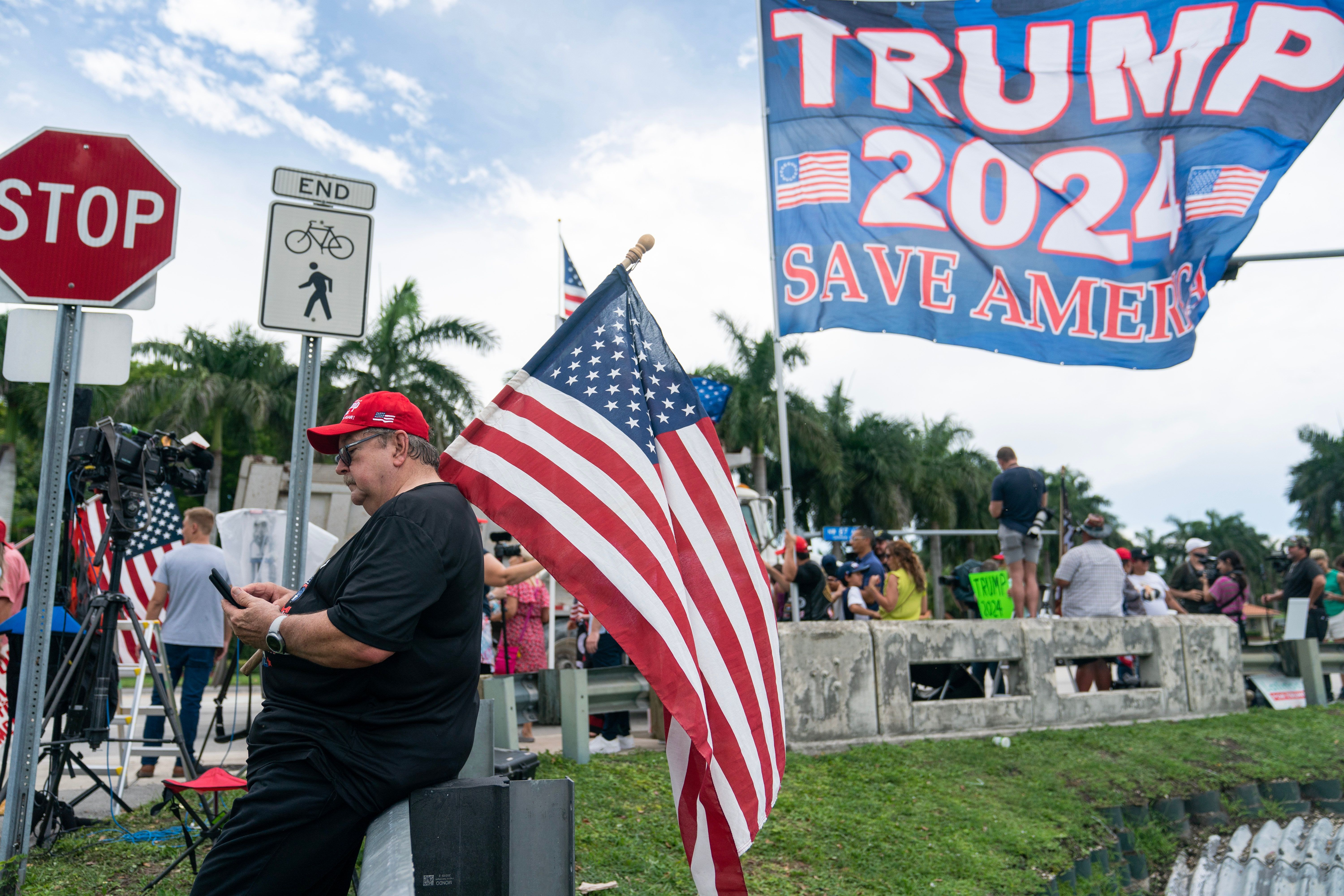 Supporters of former US President Donald Trump outside Trump National Doral Golf Club in Doral, Florida, US, on Monday, June 12, 2023. 