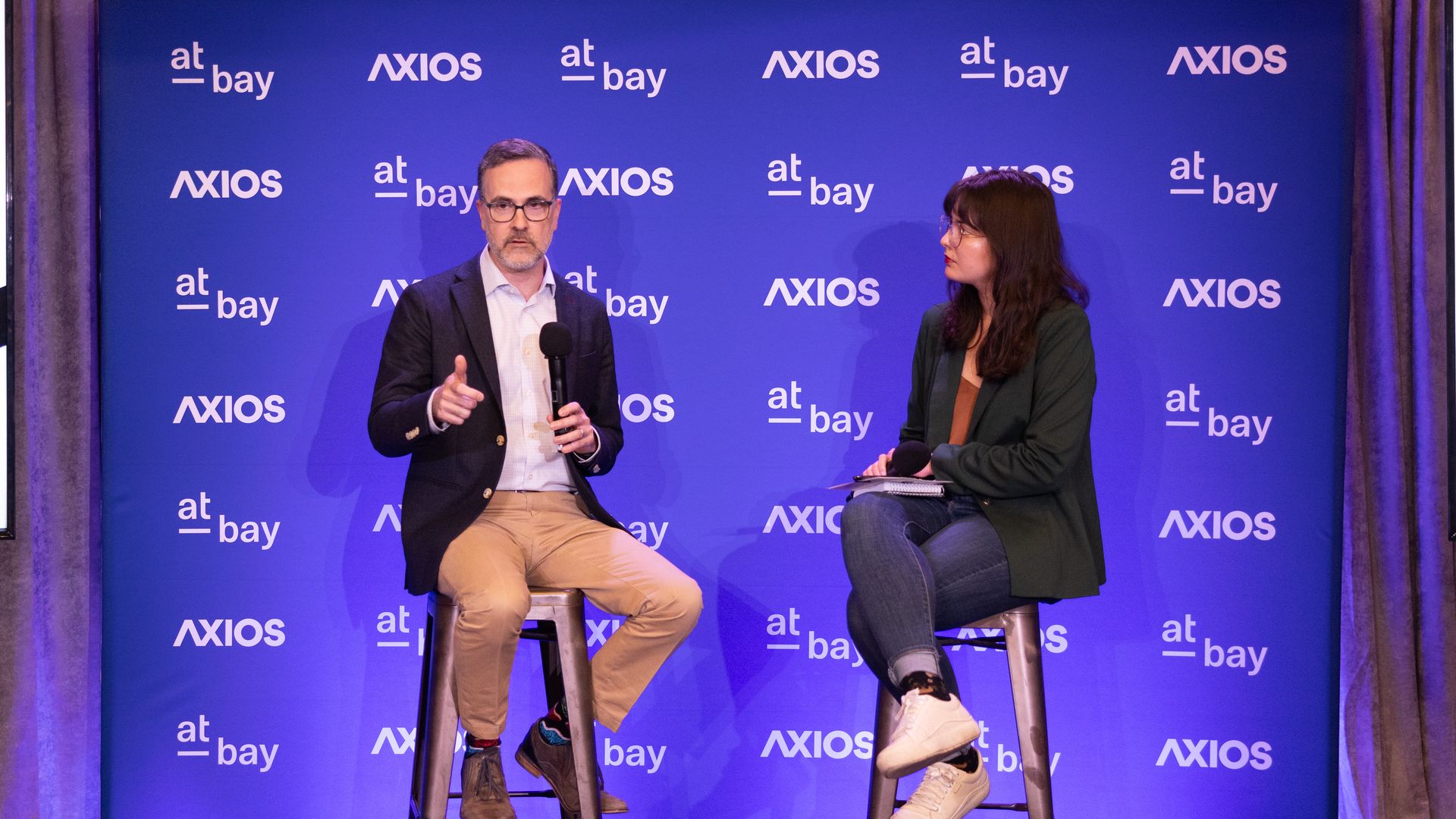 Axios reporter Sam Sabin interviews CISA Executive Director Brandon Wales at an event during the RSA Conference.