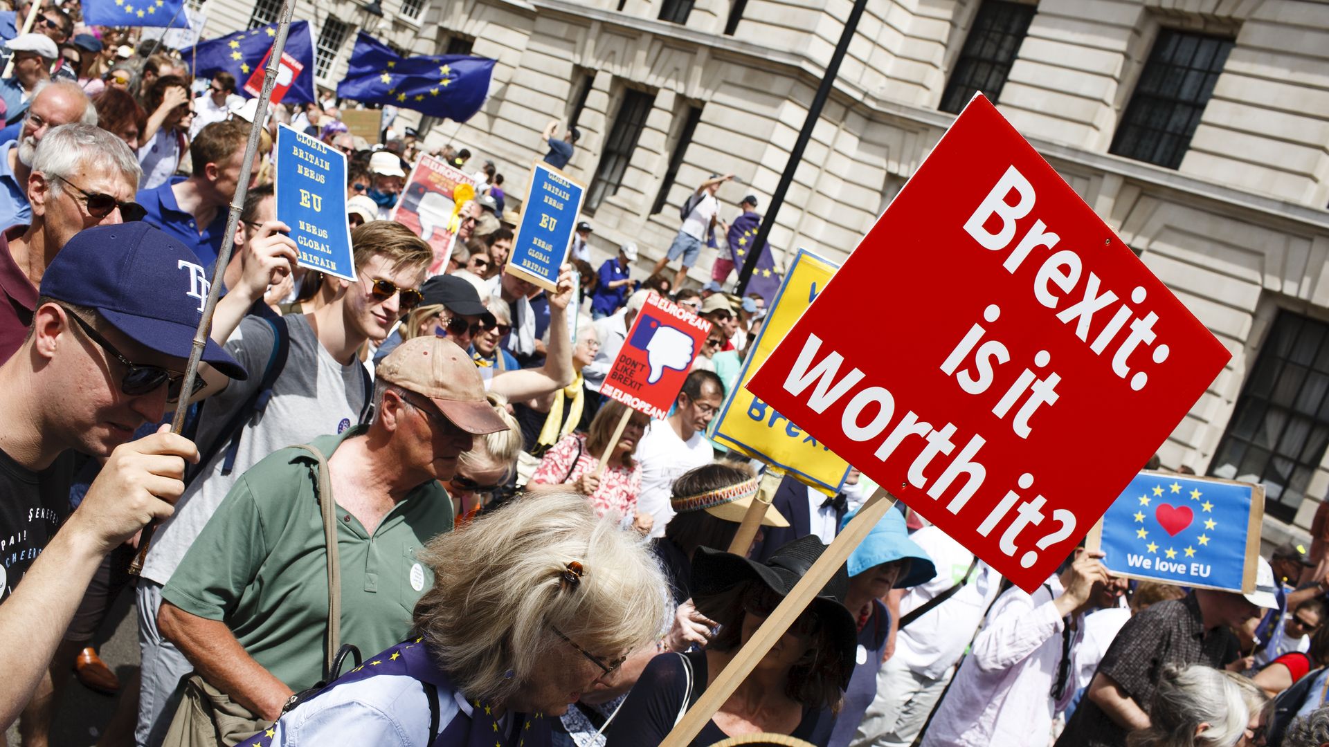Pro-EU demonstrators, with a sign reading, "Brexit: Is it worth it?"
