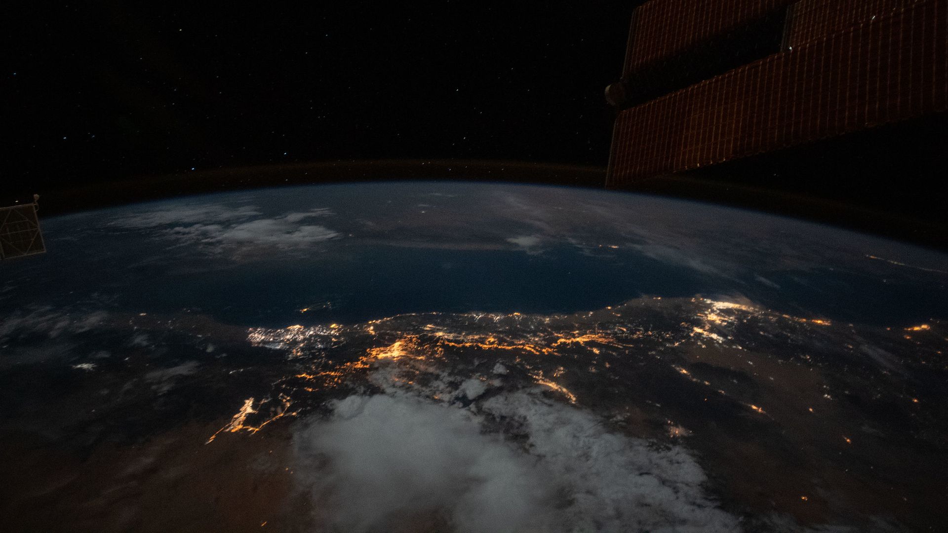 A view at night of the Earth from the International Space Station. 