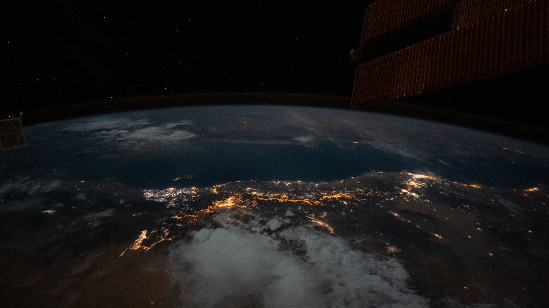 A view at night of the Earth from the International Space Station.