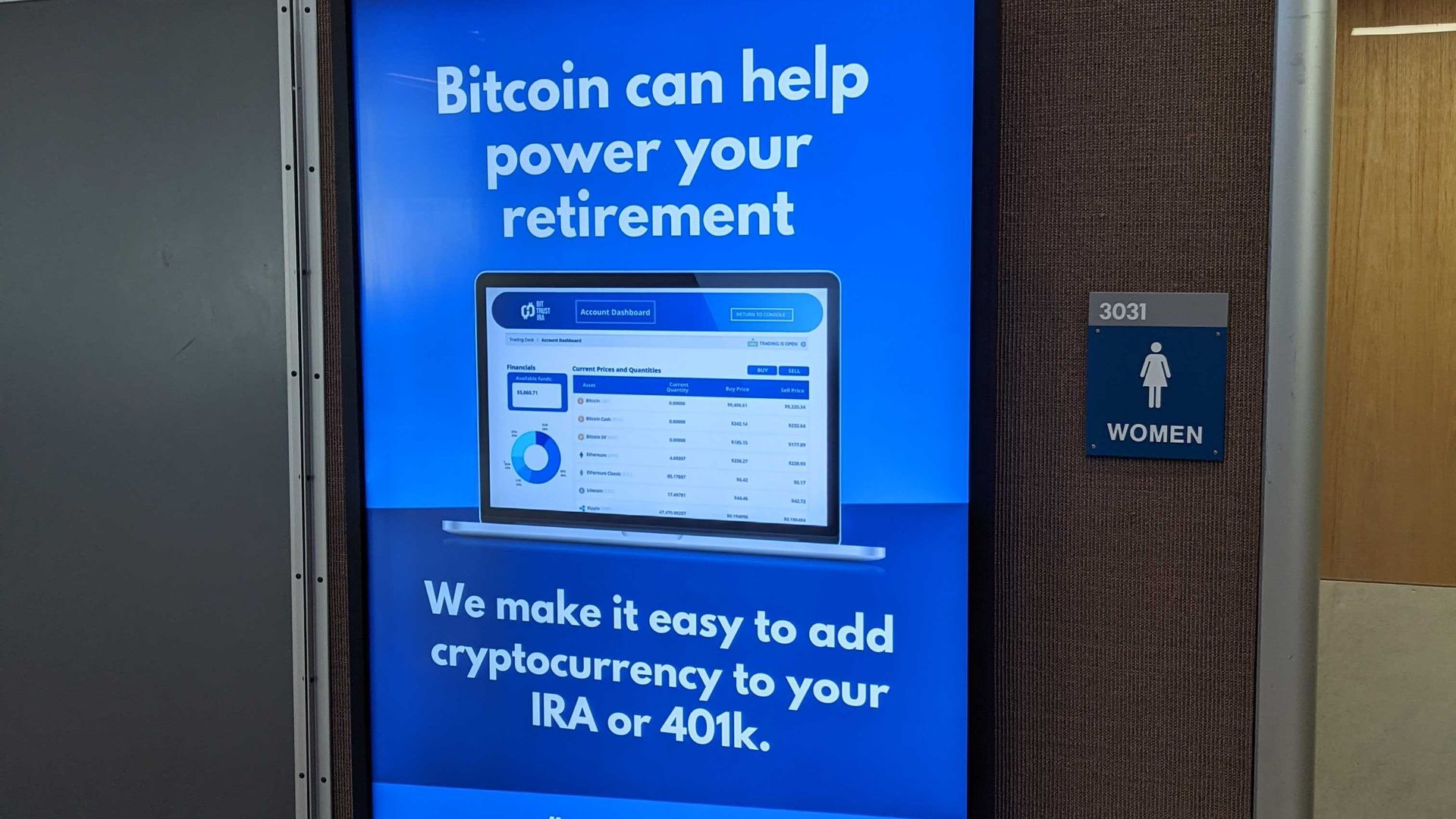 A billboard in the Austin airport advertising Bitcoin as a retirement investment.