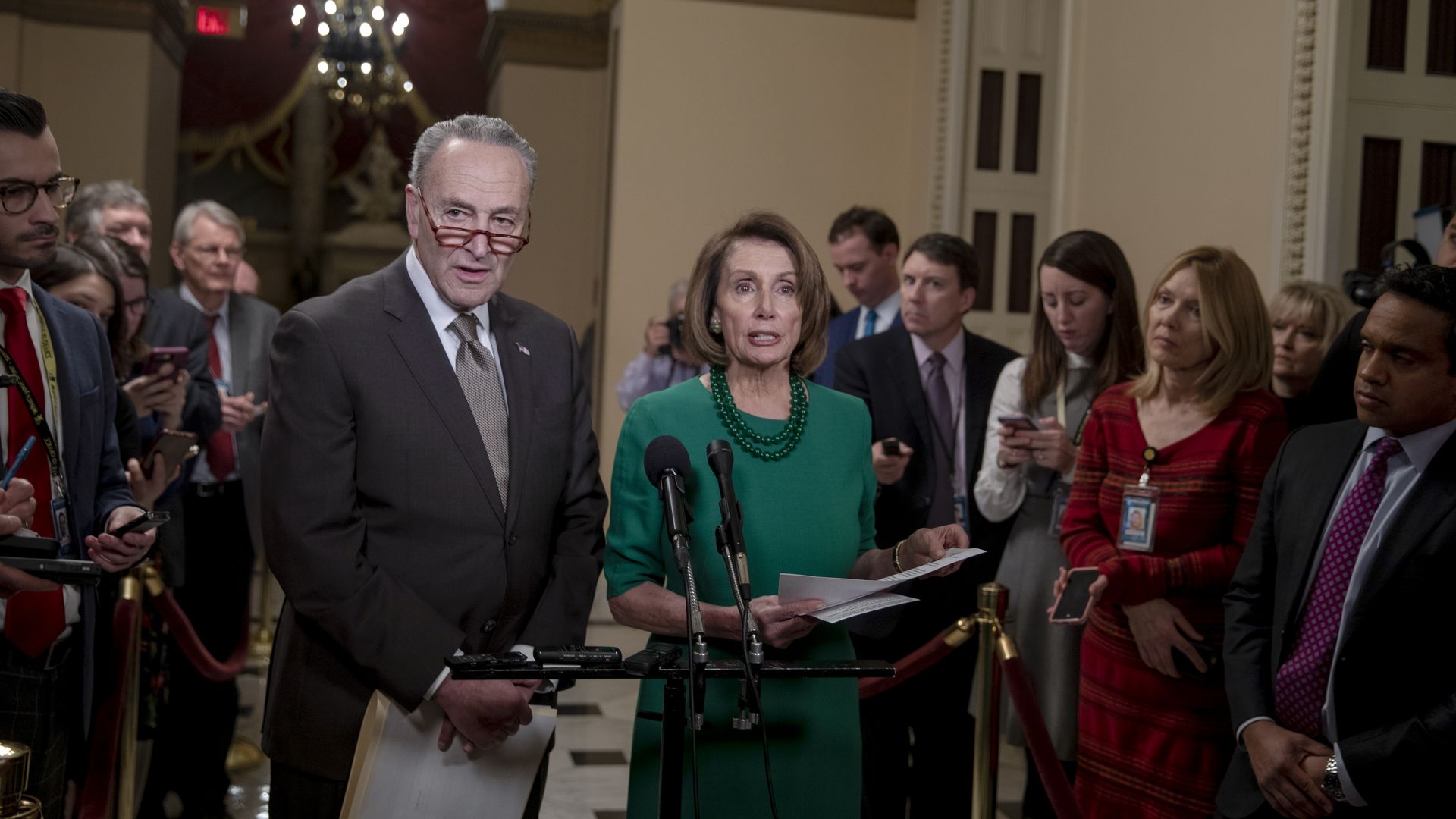 Chuck Schumer and Nancy Pelosi look flabbergasted.