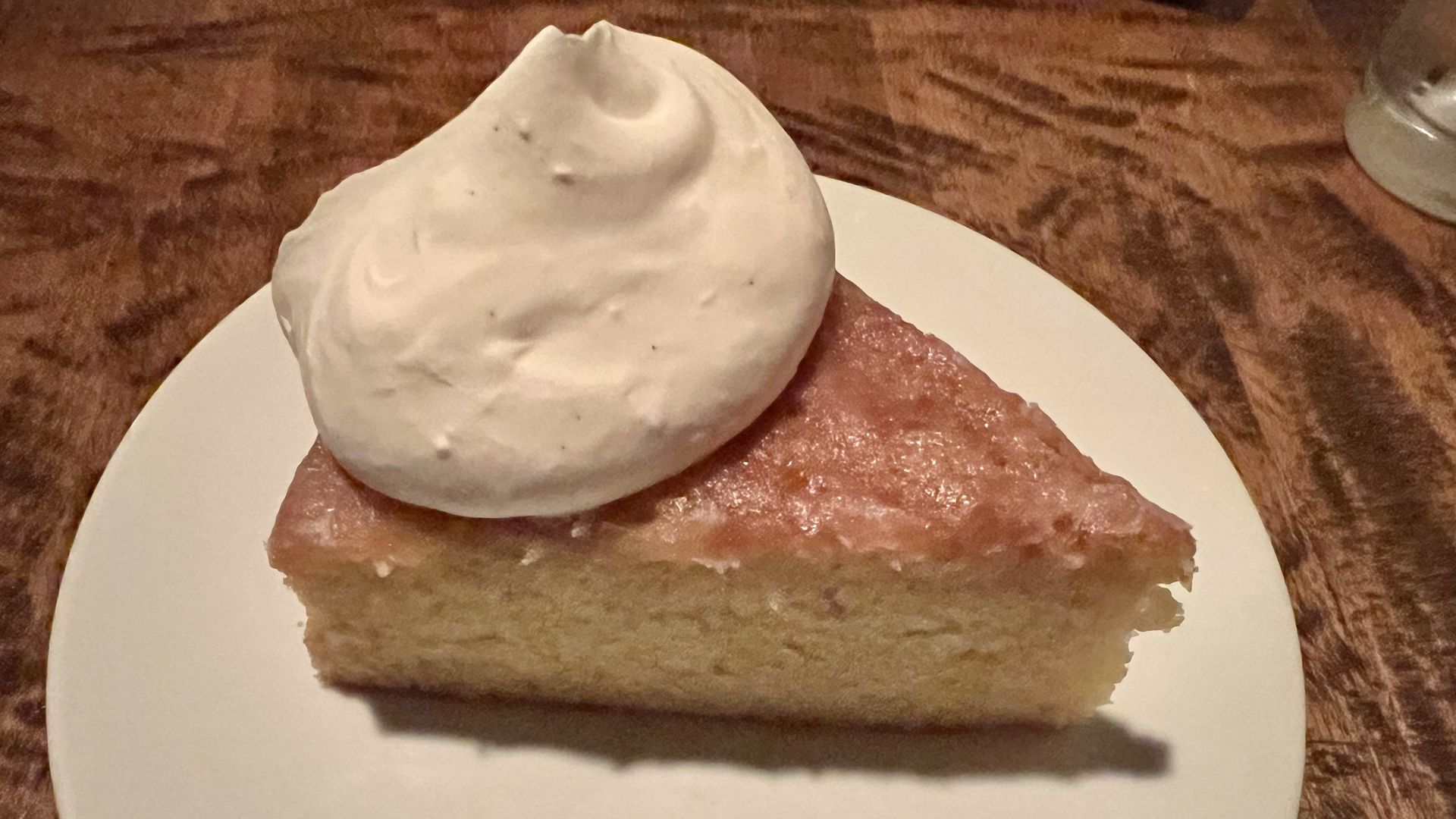 Photo of olive oil cake and whipped cream 
