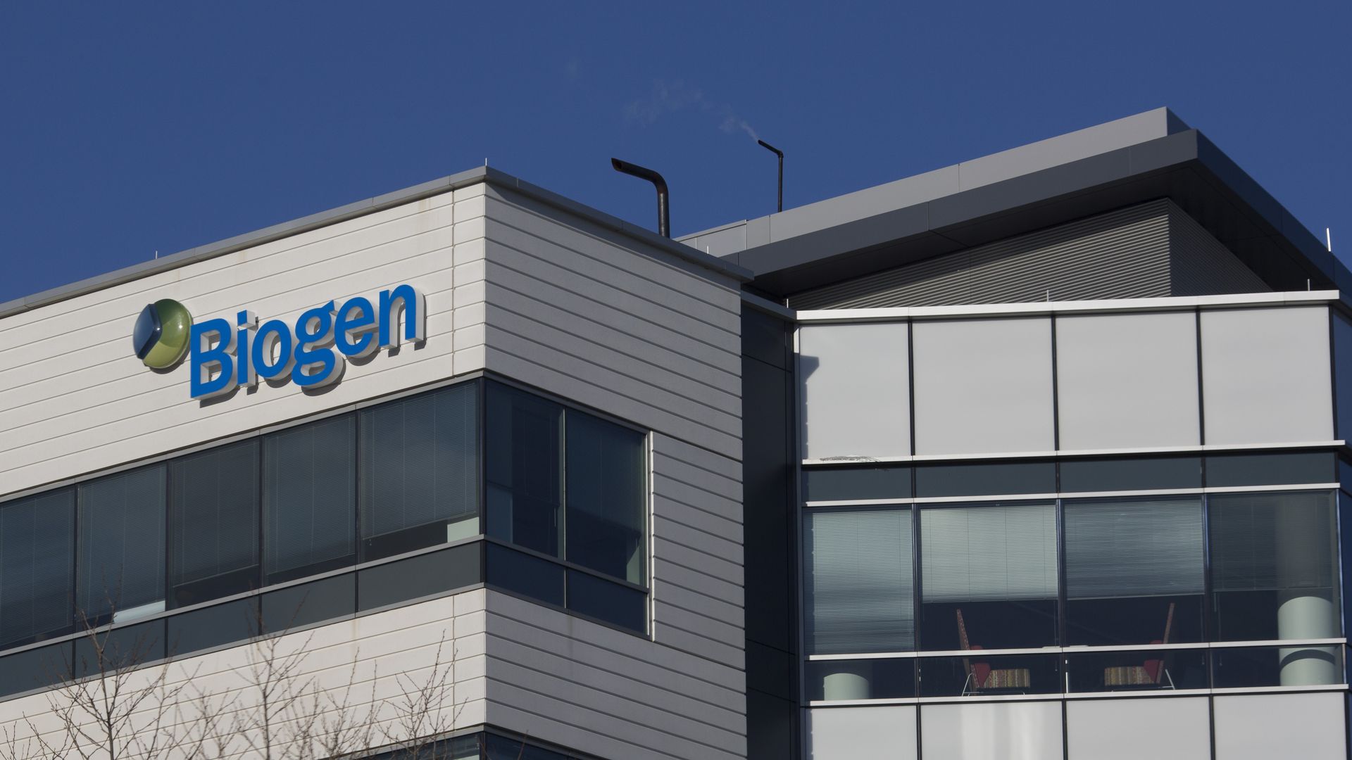 A building with the blue Biogen logo on top.