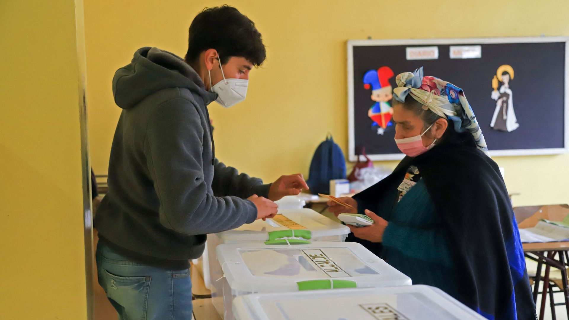 A Mapuche woman votes in Chile's elections on May 16, 2021.